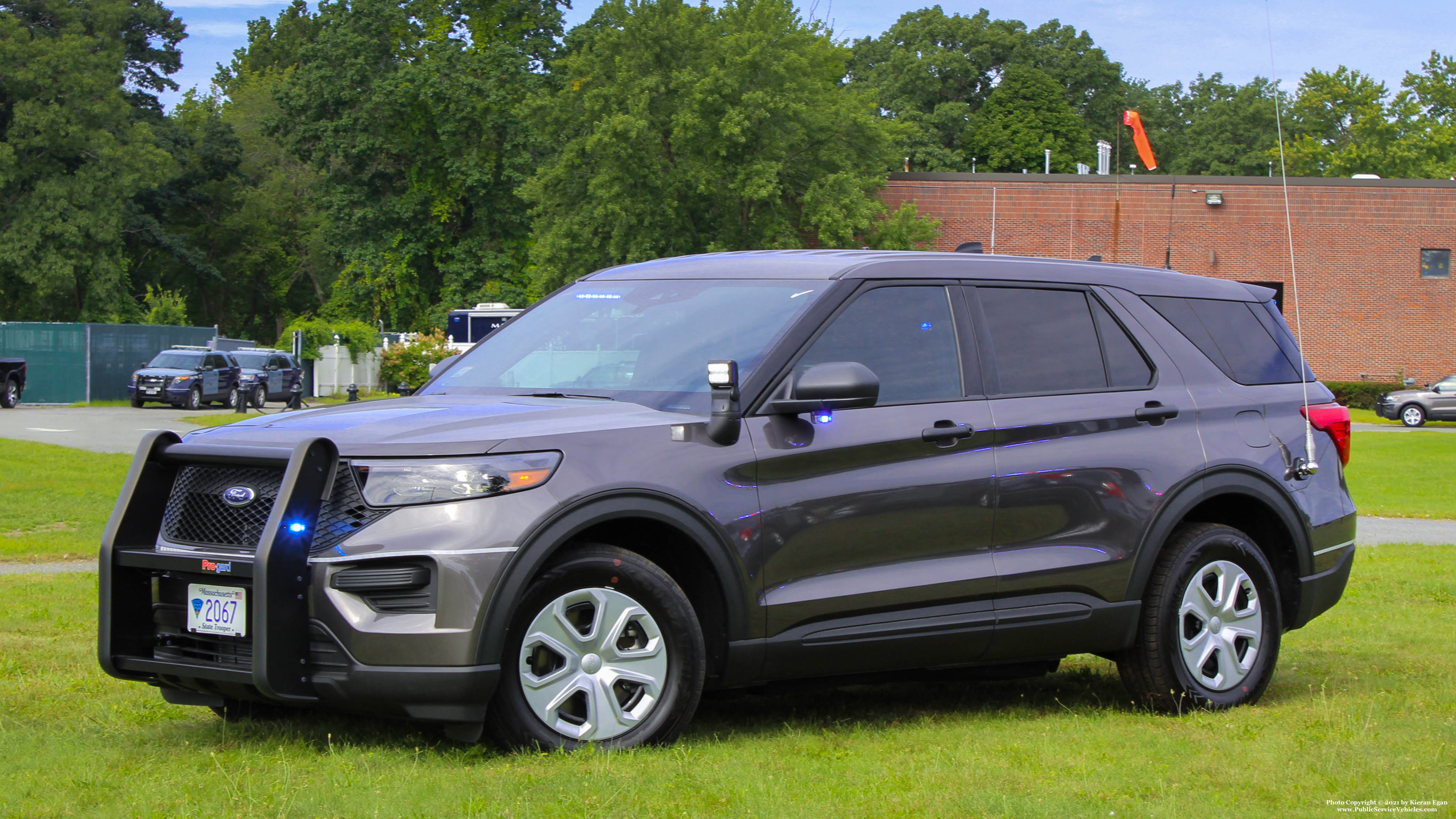 A photo  of Massachusetts State Police
            Cruiser 2067, a 2021 Ford Police Interceptor Utility Hybrid             taken by Kieran Egan