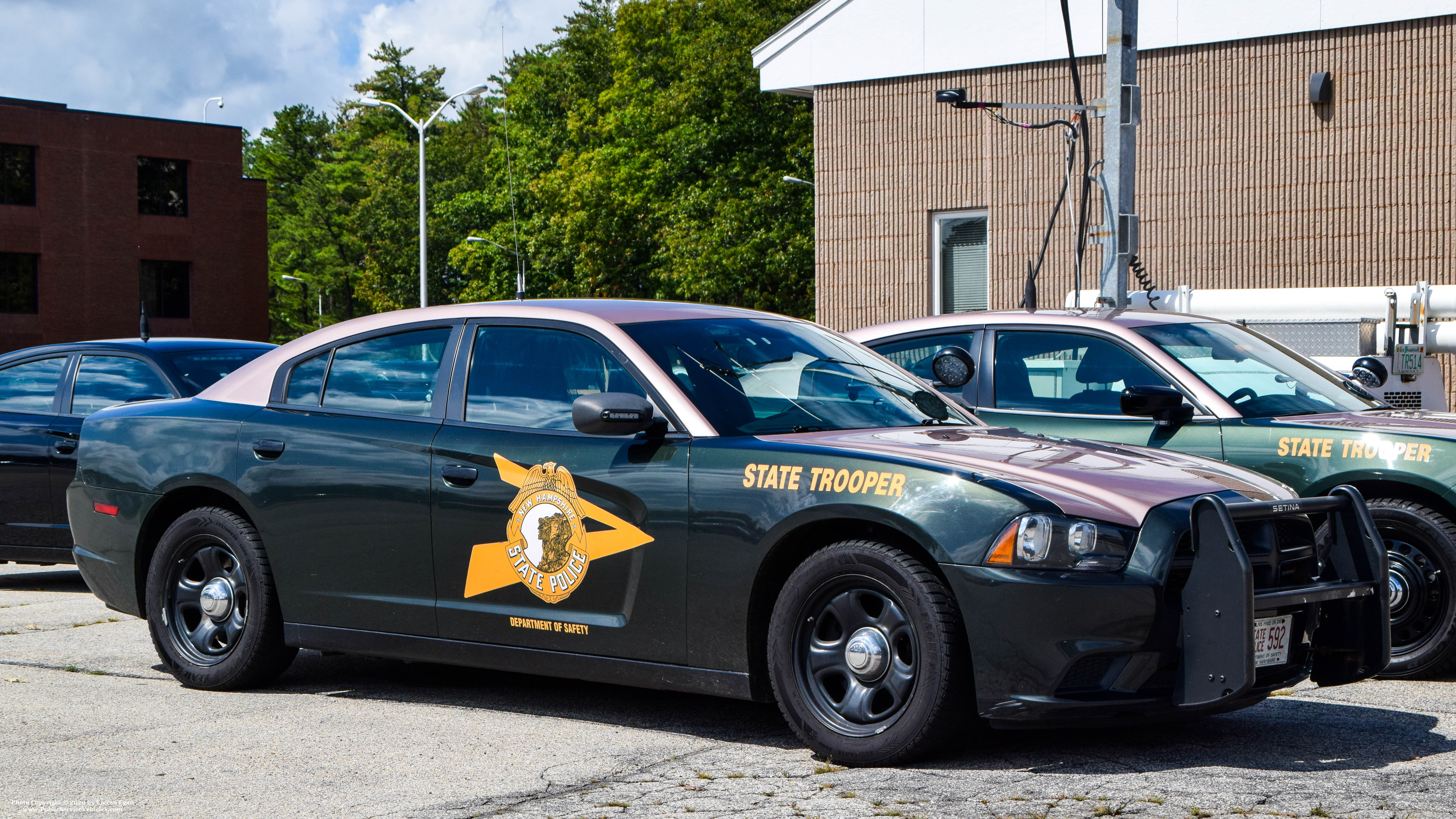 A photo  of New Hampshire State Police
            Cruiser 592, a 2011-2014 Dodge Charger             taken by Kieran Egan