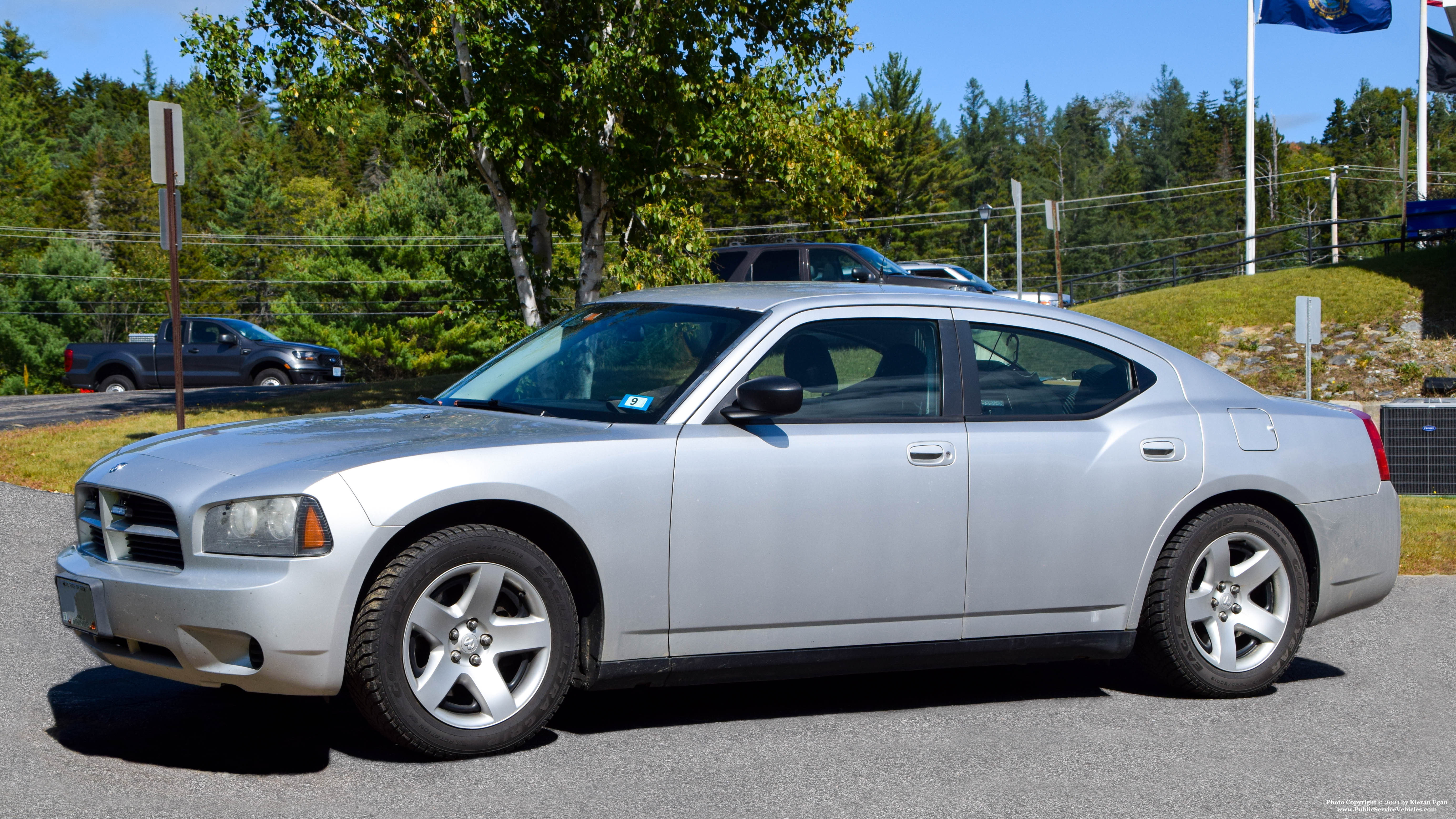 A photo  of New Hampshire State Police
            Cruiser 653, a 2006-2010 Dodge Charger             taken by Kieran Egan