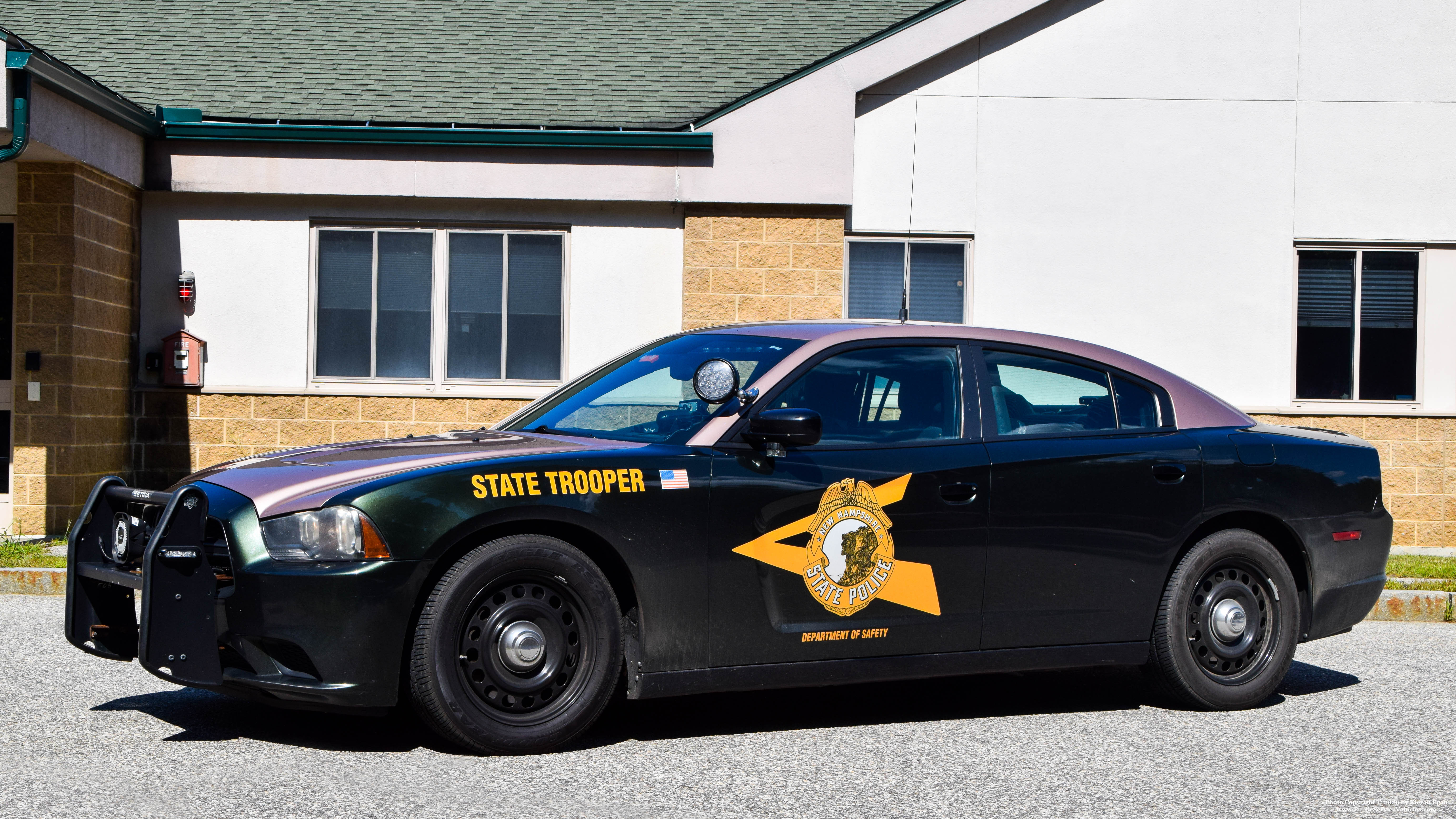 A photo  of New Hampshire State Police
            Cruiser 404, a 2014 Dodge Charger             taken by Kieran Egan