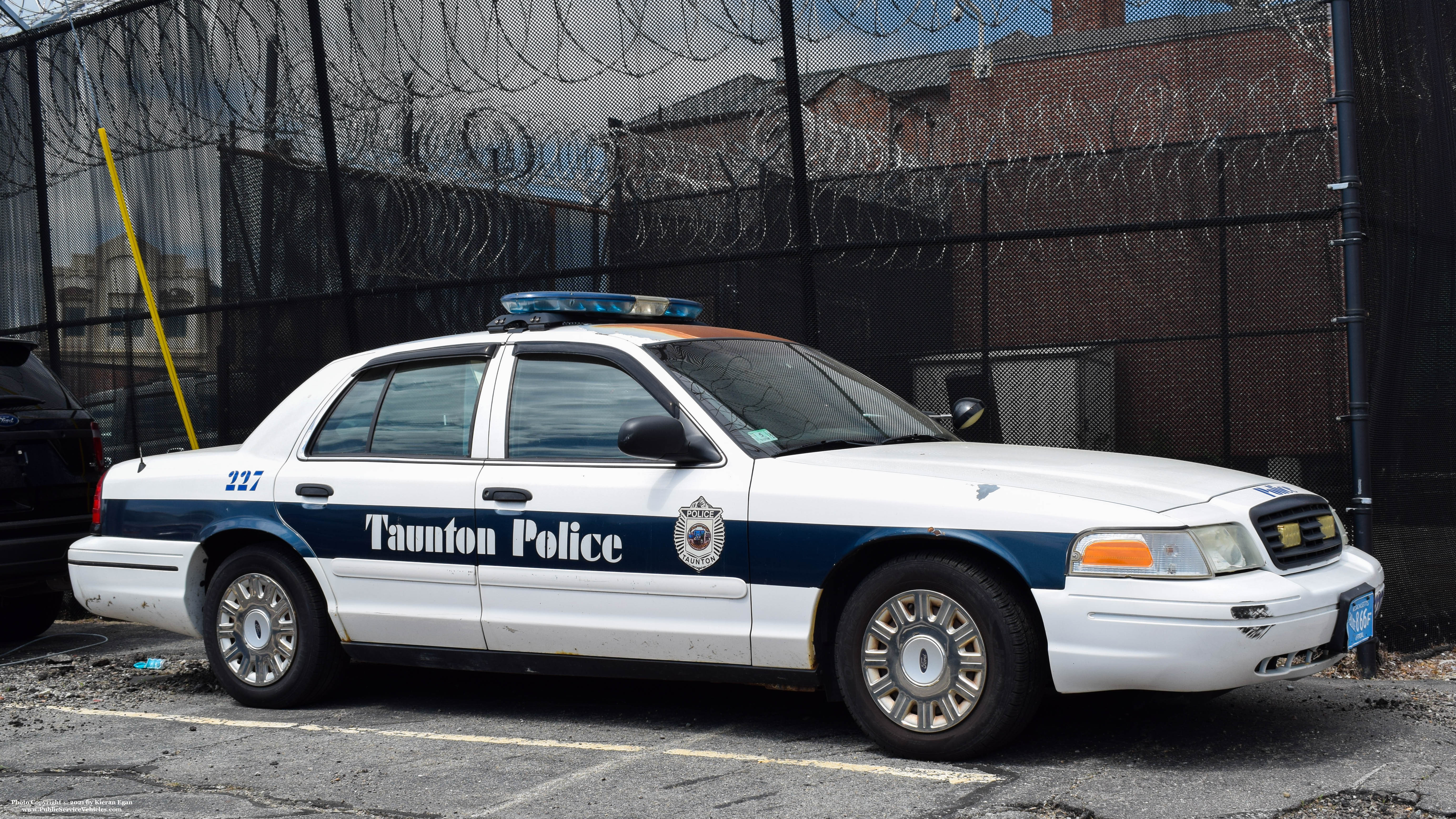 A photo  of Taunton Police
            Cruiser 227, a 2005 Ford Crown Victoria Police Interceptor             taken by Kieran Egan