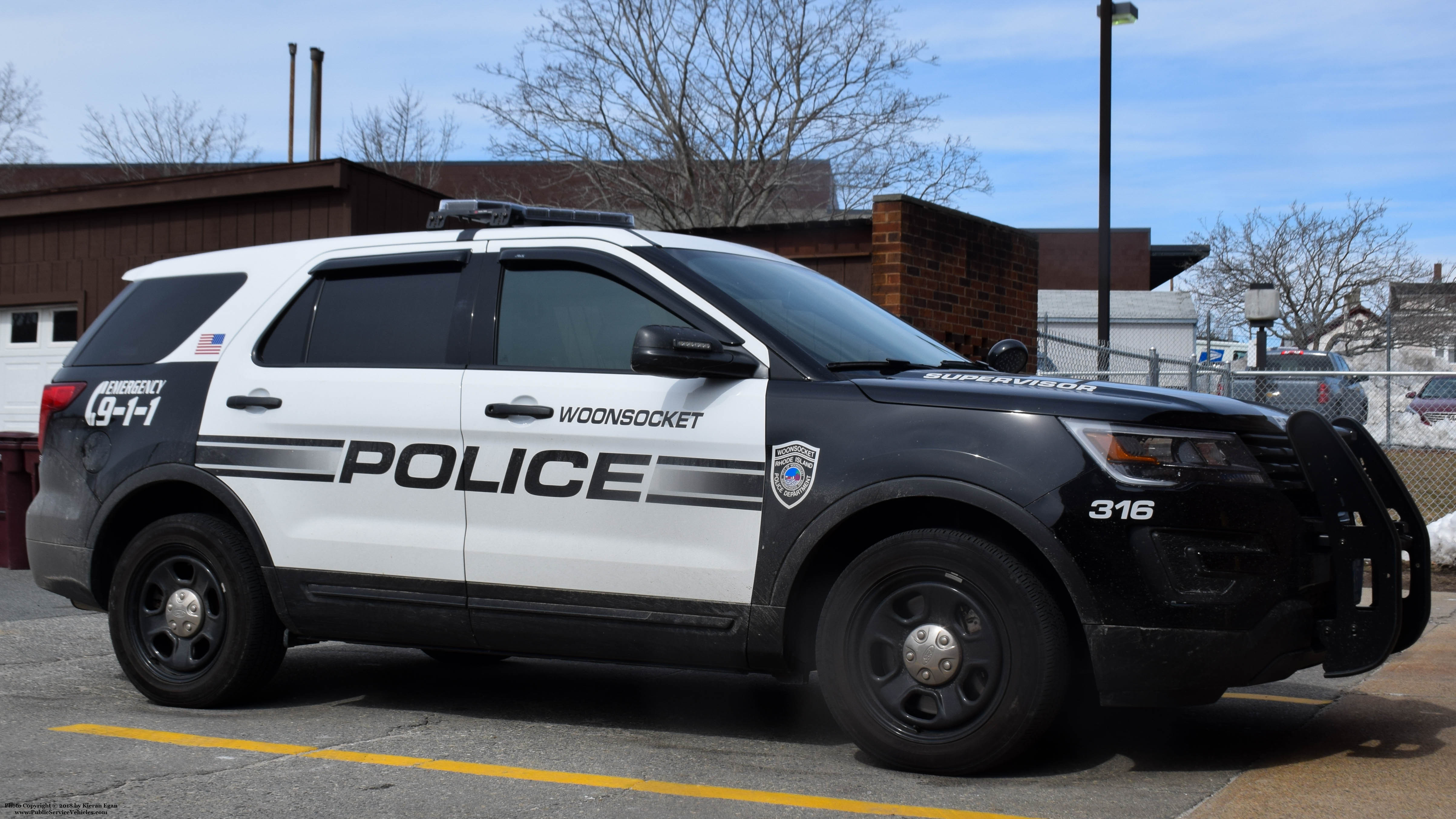 A photo  of Woonsocket Police
            Cruiser 316, a 2016-2018 Ford Police Interceptor Utility             taken by Kieran Egan