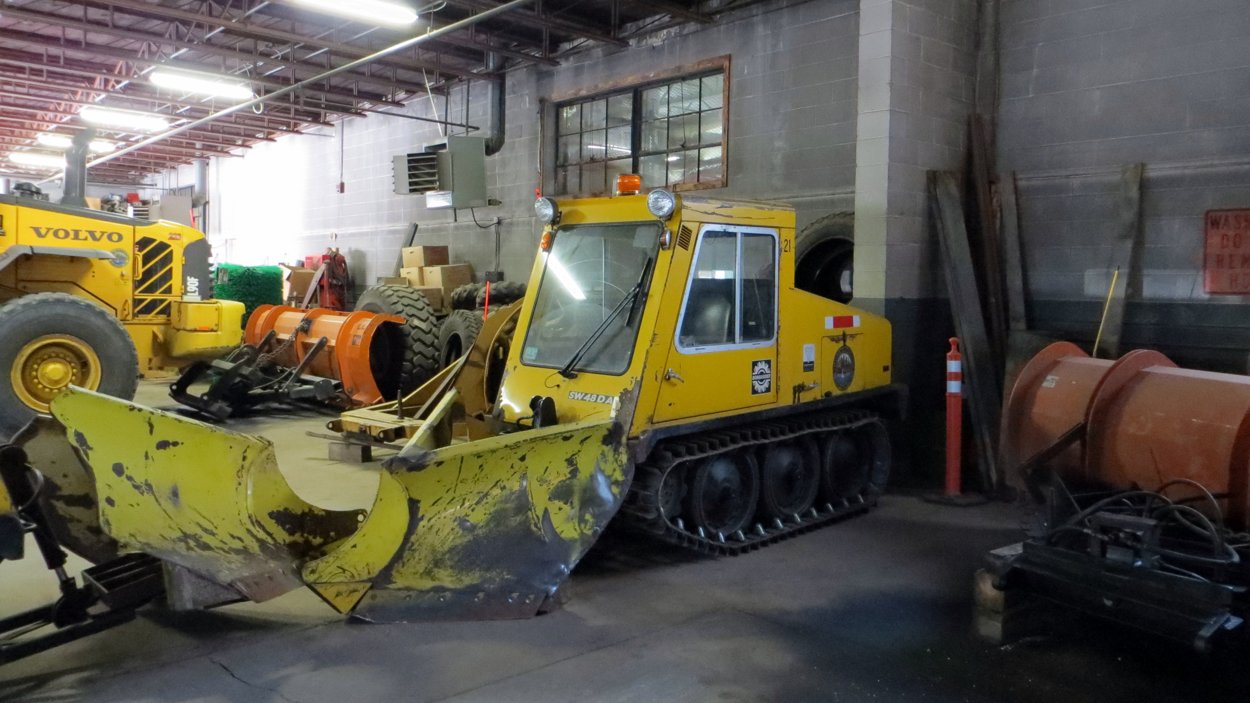 A photo  of Walpole Parks Department
            Sidewalk Plow 321, a 1992 Bombardier Sidewalk Plow             taken by Kieran Egan