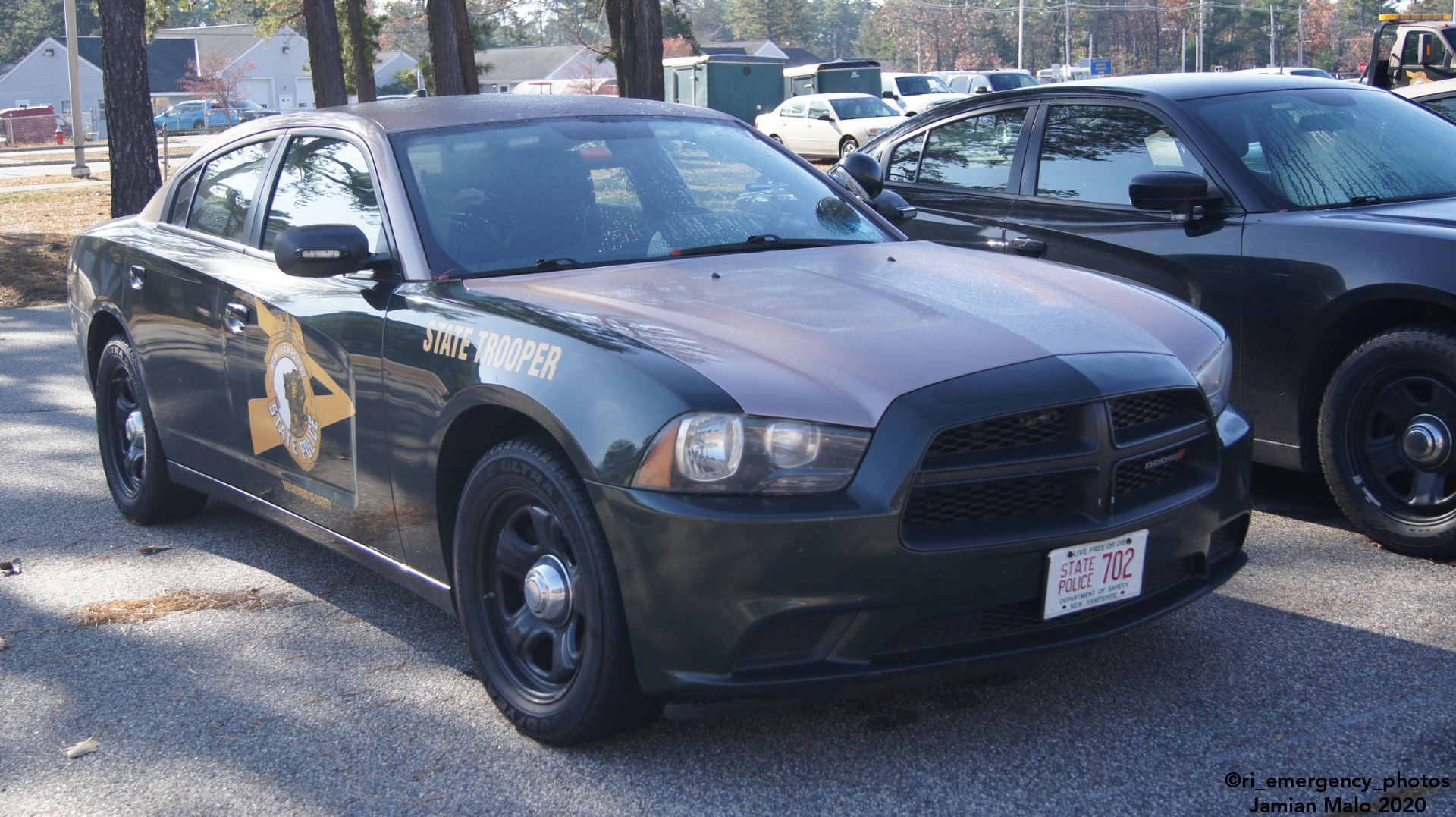 A photo  of New Hampshire State Police
            Cruiser 702, a 2011-2014 Dodge Charger             taken by Jamian Malo