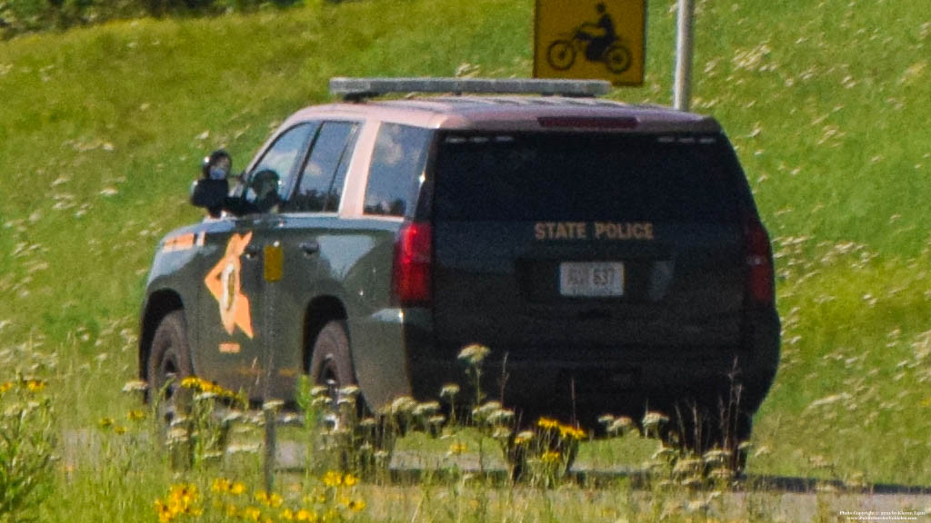 A photo  of New Hampshire State Police
            Cruiser 637, a 2016 Chevrolet Tahoe             taken by Kieran Egan