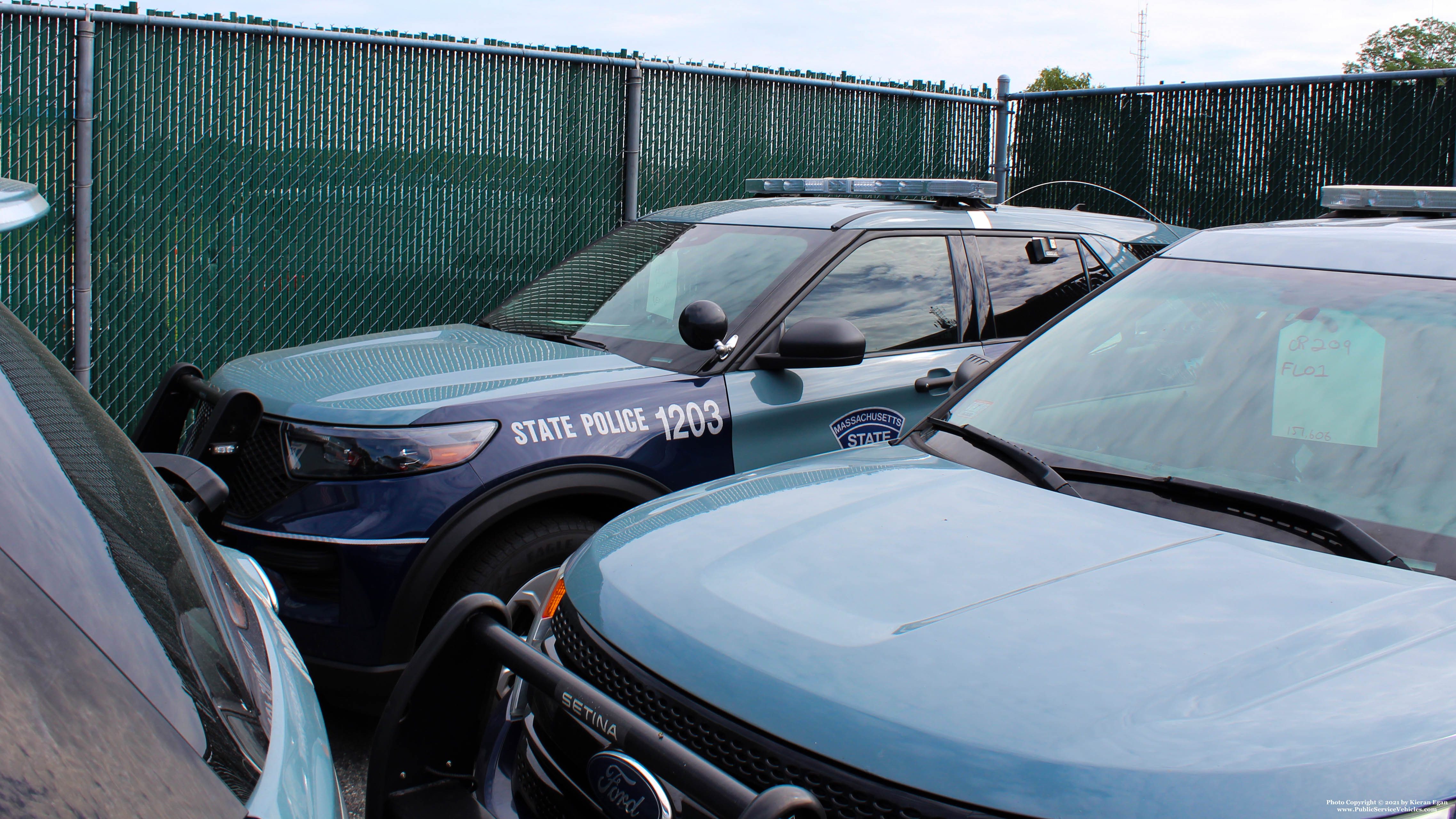 A photo  of Massachusetts State Police
            Cruiser 1203, a 2020 Ford Police Interceptor Utility Hybrid             taken by Kieran Egan