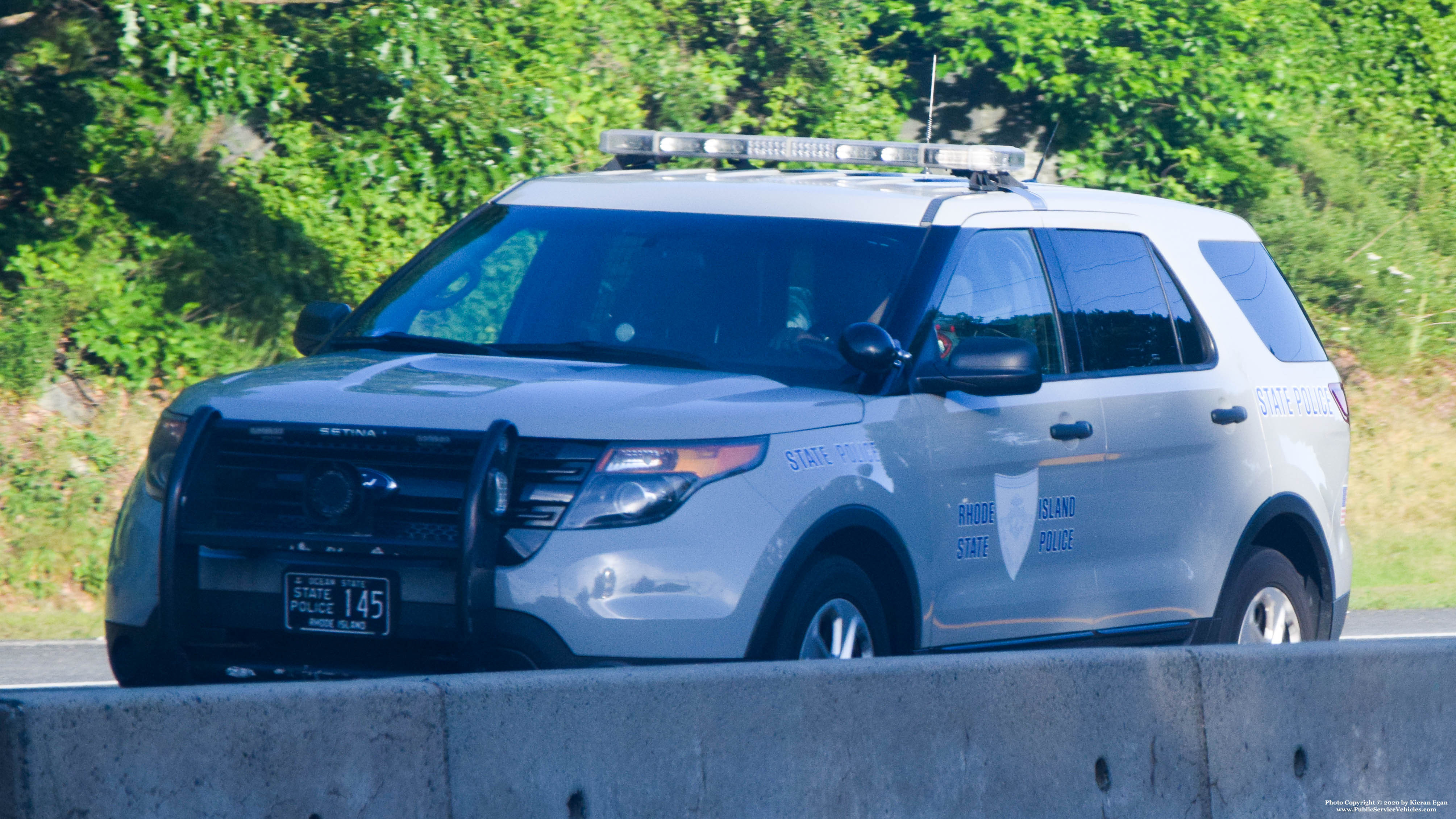 A photo  of Rhode Island State Police
            Cruiser 145, a 2013-2015 Ford Police Interceptor Utility             taken by Kieran Egan