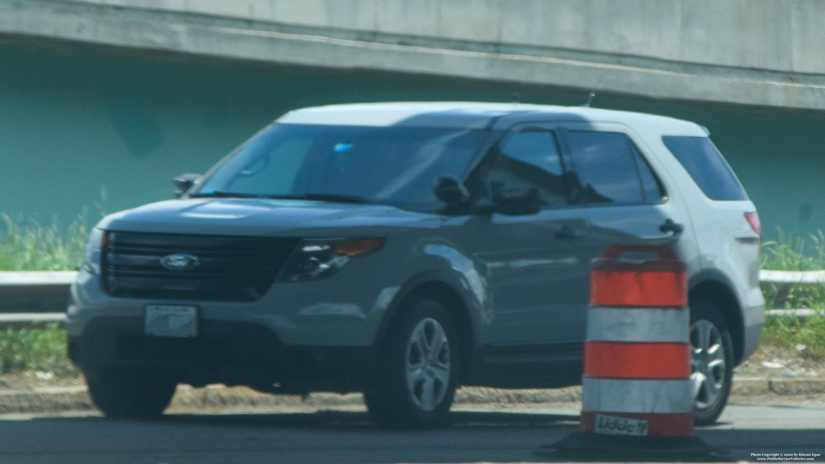 A photo  of Rhode Island State Police
            Unmarked Unit, a 2013-2015 Ford Police Interceptor Utility             taken by Kieran Egan