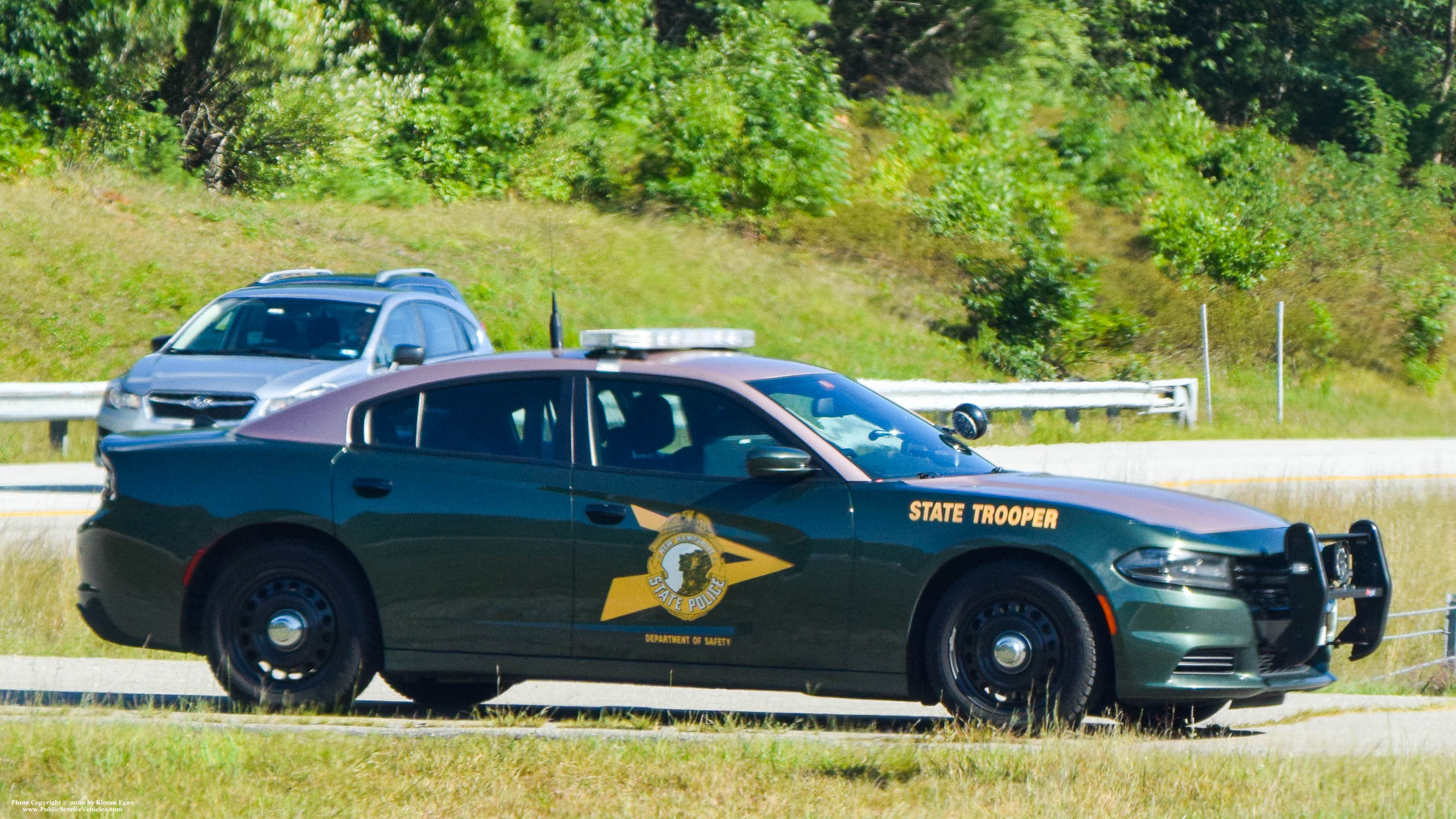 A photo  of New Hampshire State Police
            Cruiser 211, a 2015-2019 Dodge Charger             taken by Kieran Egan