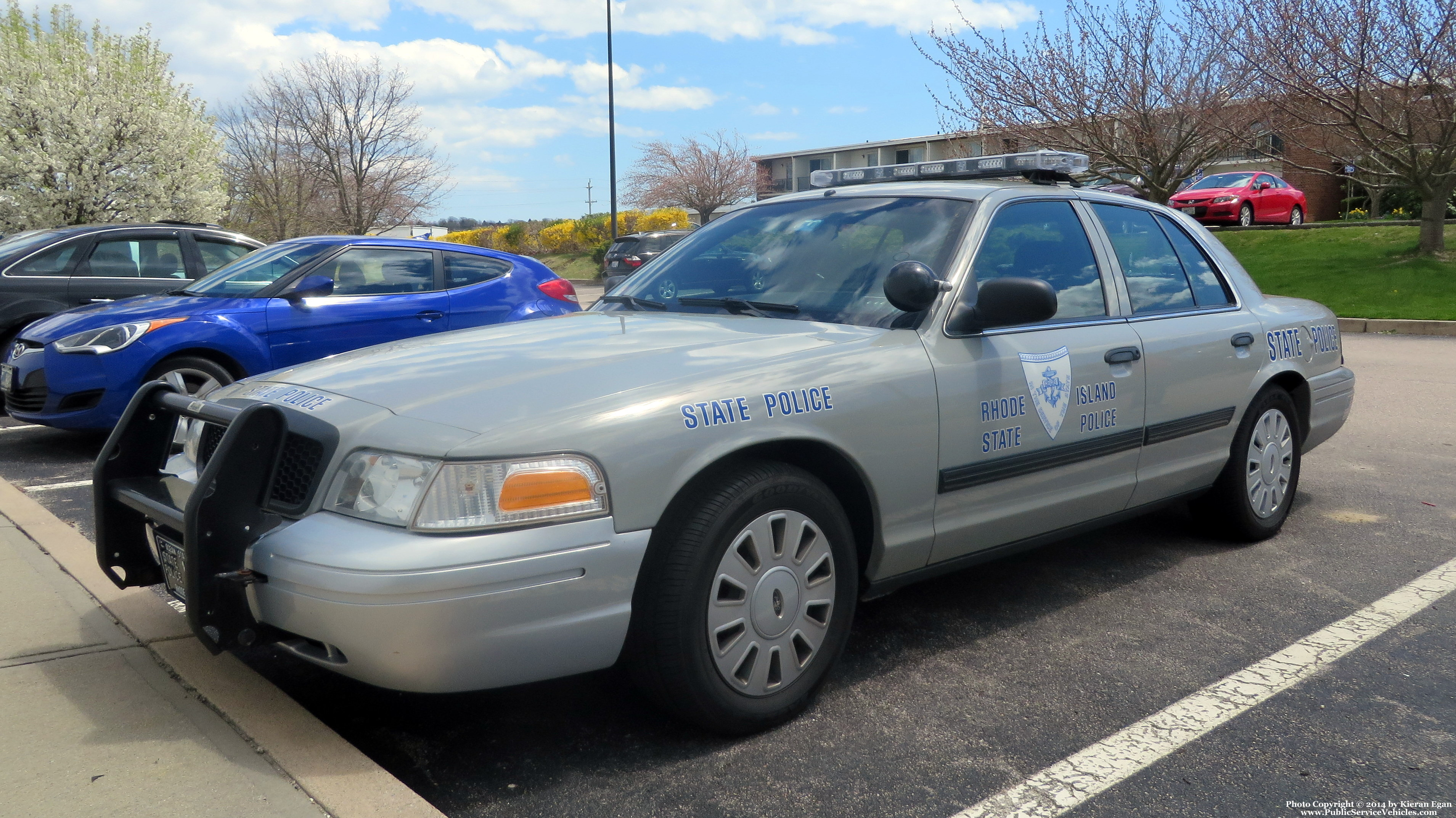 A photo  of Rhode Island State Police
            Cruiser 158, a 2009-2011 Ford Crown Victoria Police Interceptor             taken by Kieran Egan