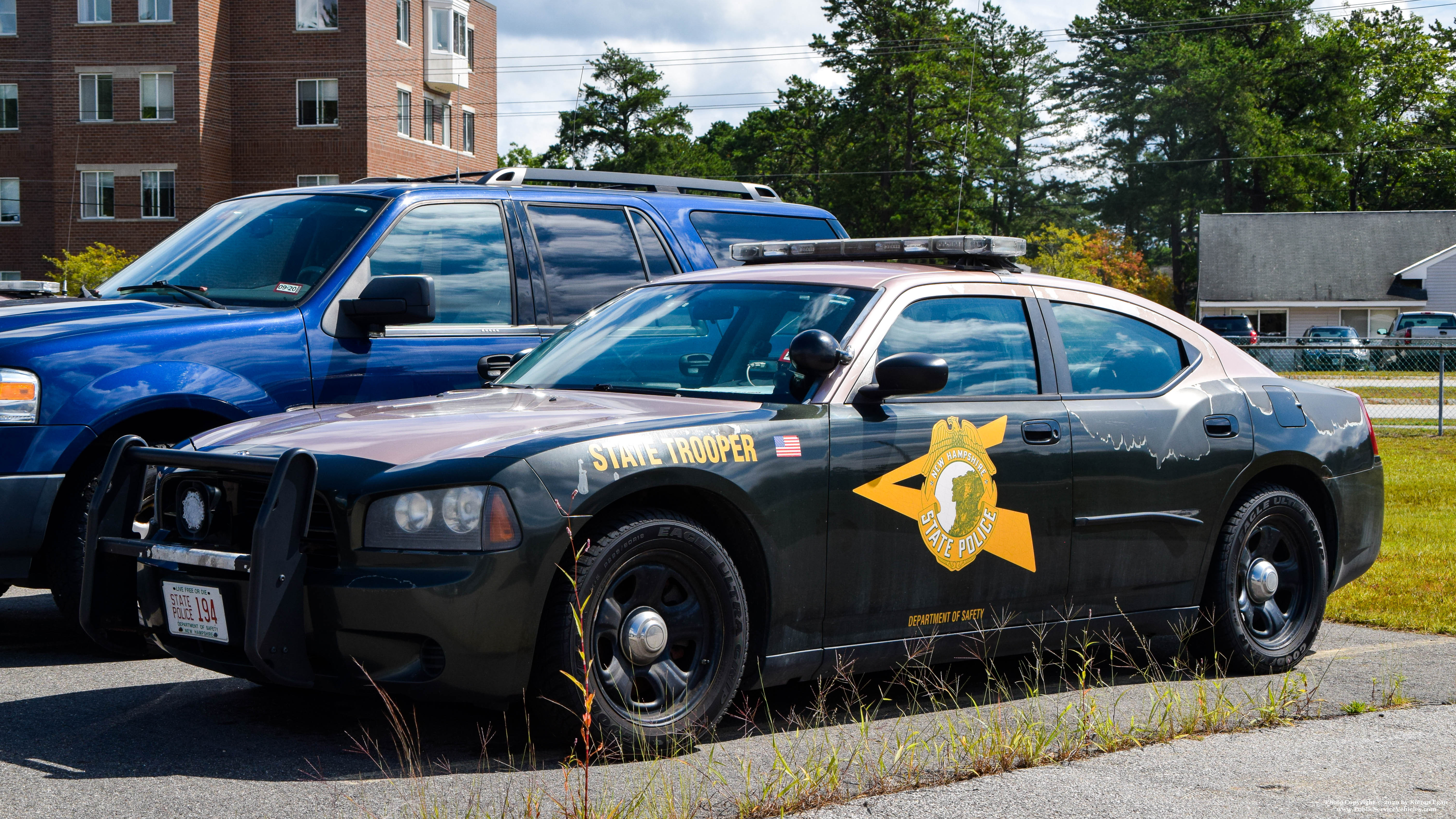 A photo  of New Hampshire State Police
            Cruiser 194, a 2006-2010 Dodge Charger             taken by Kieran Egan