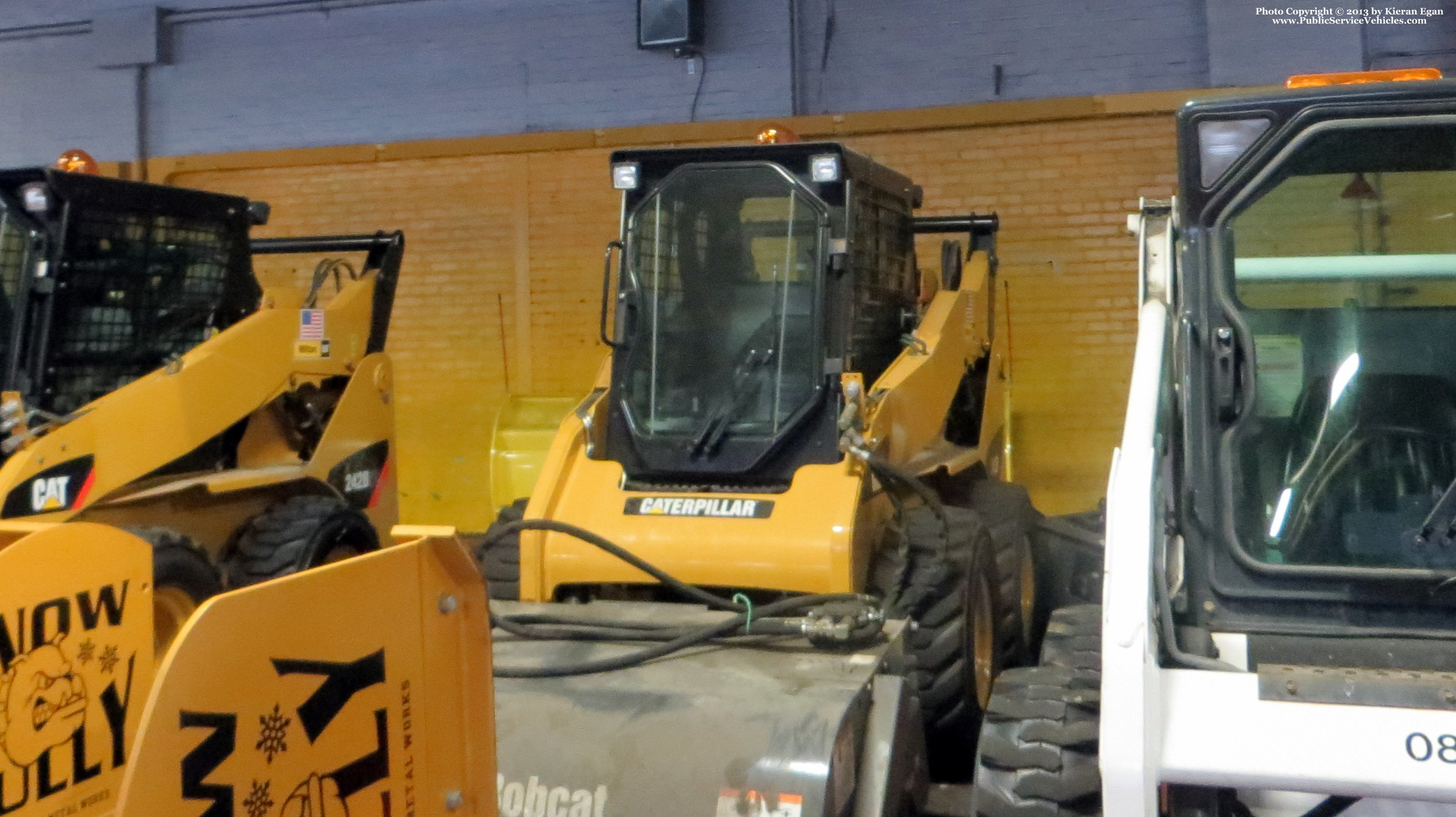 A photo  of Rhode Island Public Transit Authority
            Skidsteer 61017, a 2010 Caterpillar 242B2             taken by Kieran Egan