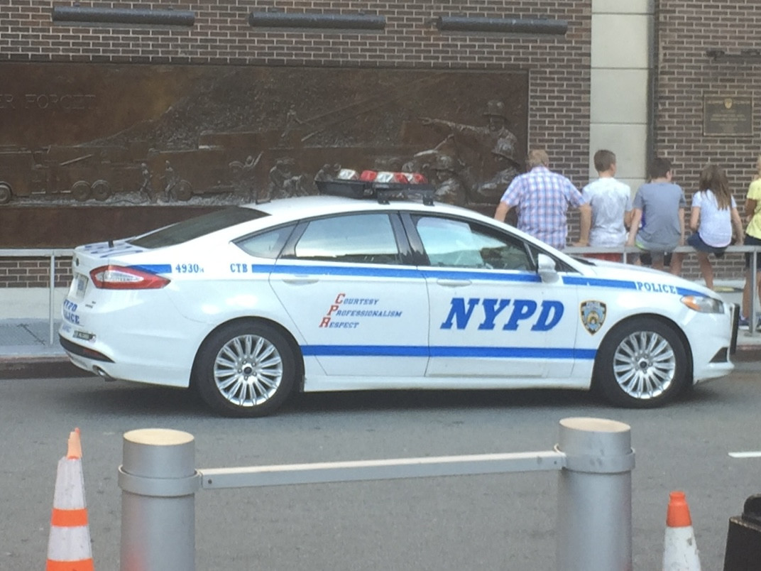 A photo  of New York Police Department
            Cruiser 4930 14, a 2014 Ford Fusion             taken by @riemergencyvehicles