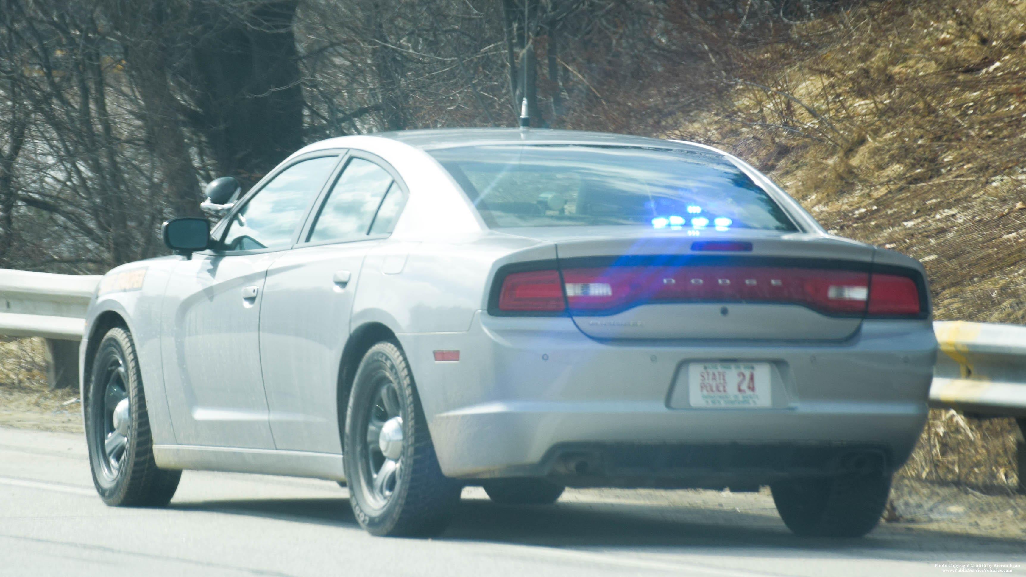A photo  of New Hampshire State Police
            Cruiser 24, a 2011-2014 Dodge Charger             taken by Kieran Egan