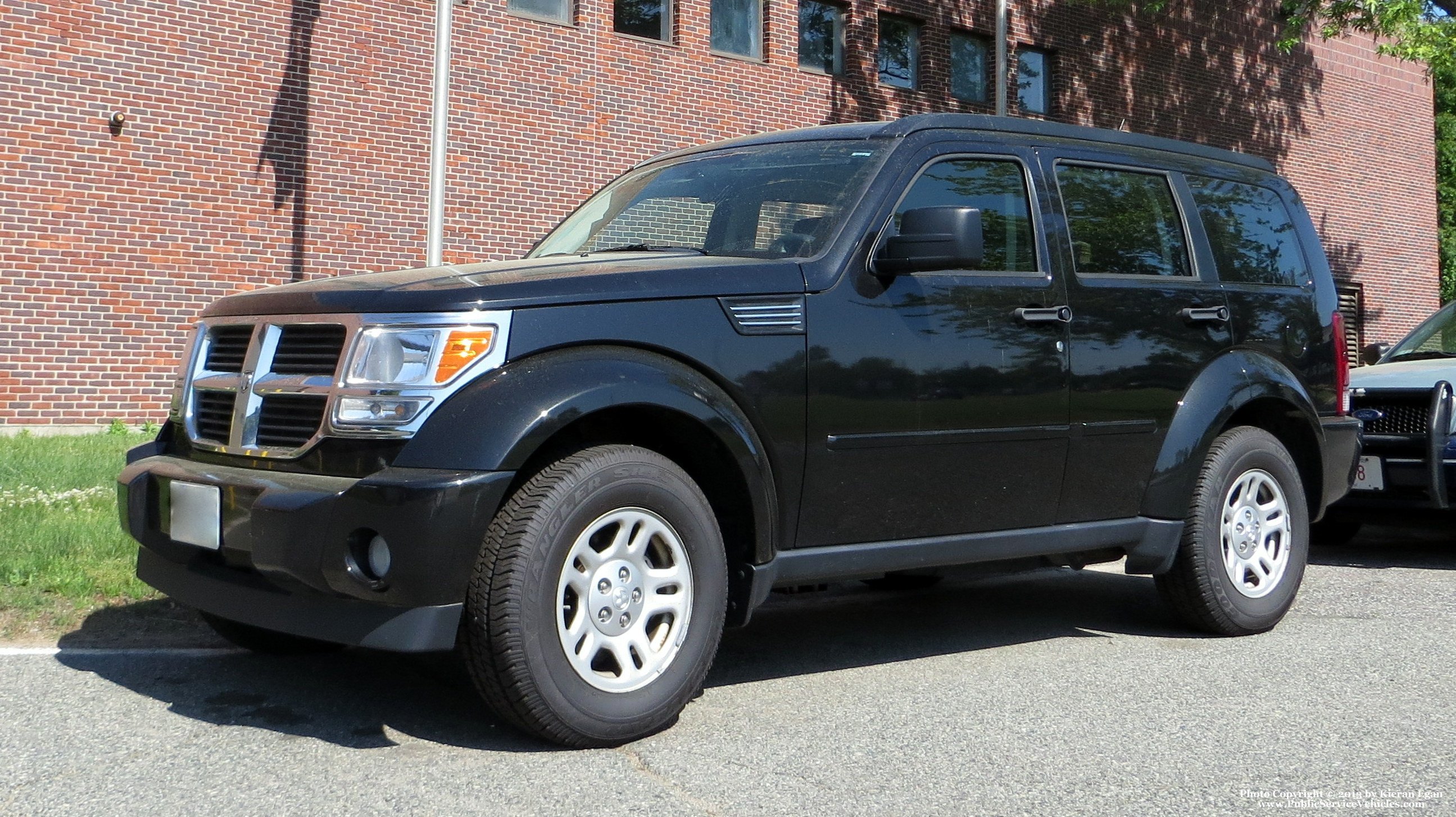 A photo  of Massachusetts State Police
            Unmarked Unit, a 2007-2012 Dodge Nitro             taken by Kieran Egan