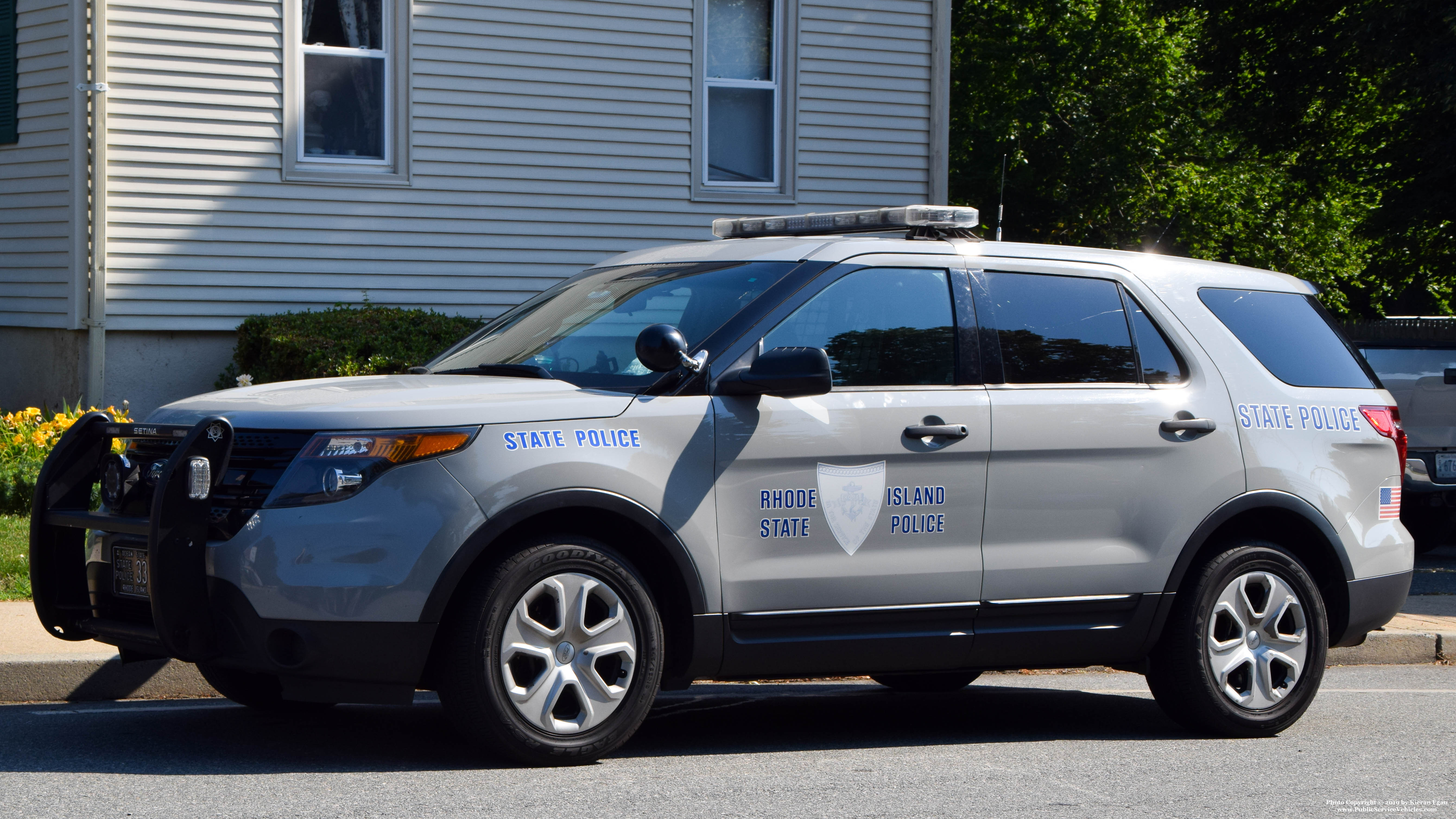 A photo  of Rhode Island State Police
            Cruiser 33, a 2013-2015 Ford Police Interceptor Utility             taken by Kieran Egan