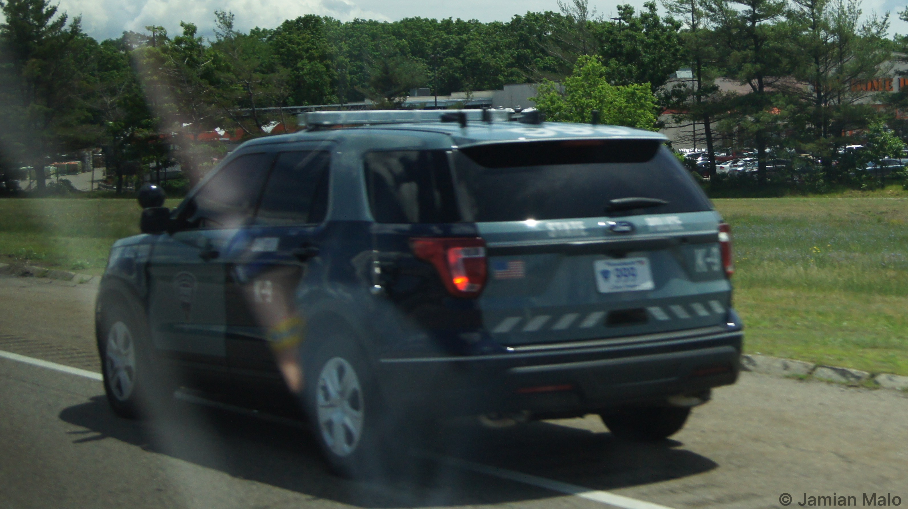 A photo  of Massachusetts State Police
            Cruiser 999, a 2016-2019 Ford Police Interceptor Utility             taken by Jamian Malo