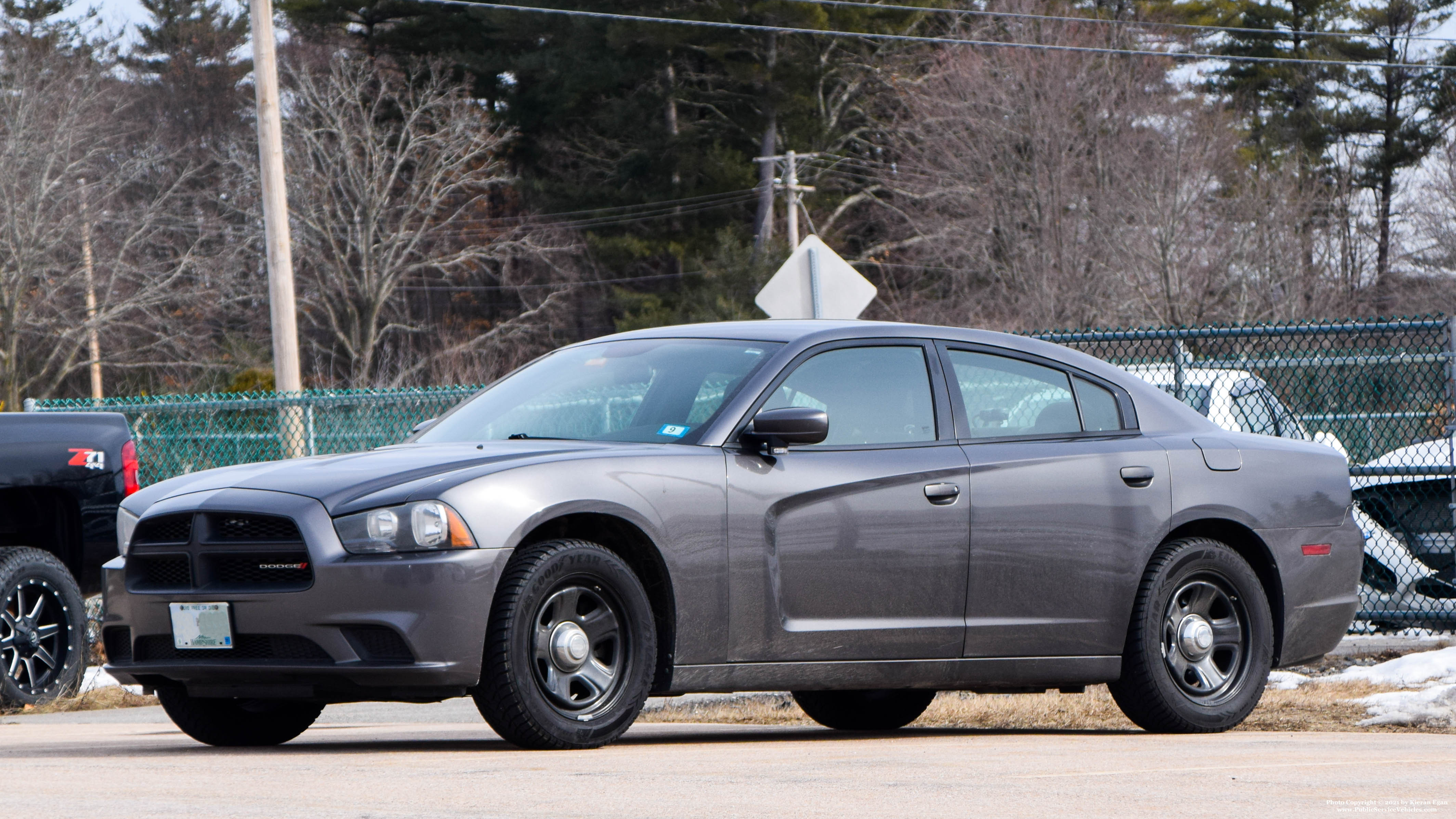 A photo  of New Hampshire State Police
            Cruiser 251, a 2011-2014 Dodge Charger             taken by Kieran Egan