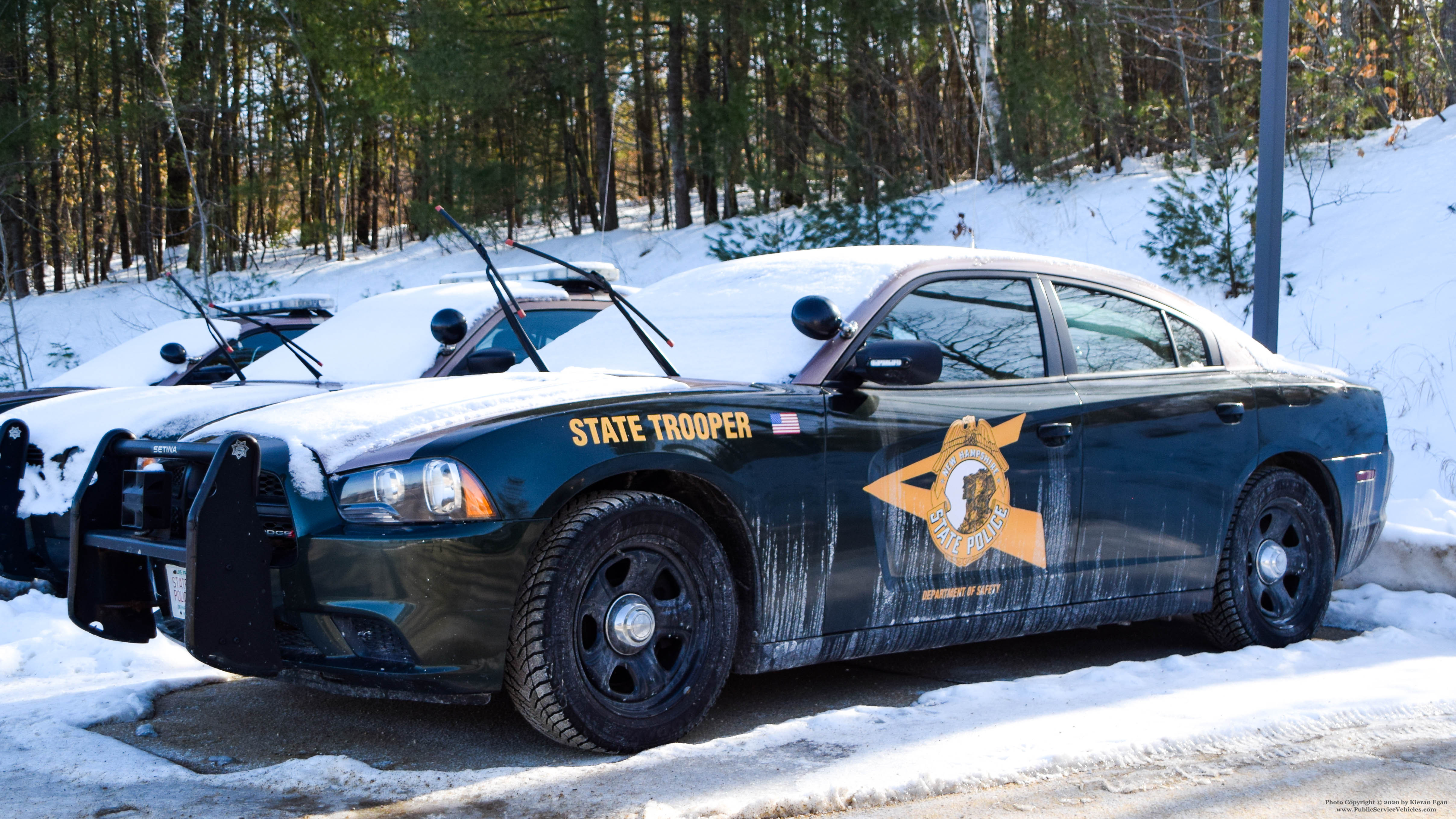 A photo  of New Hampshire State Police
            Cruiser 497, a 2011-2013 Dodge Charger             taken by Kieran Egan