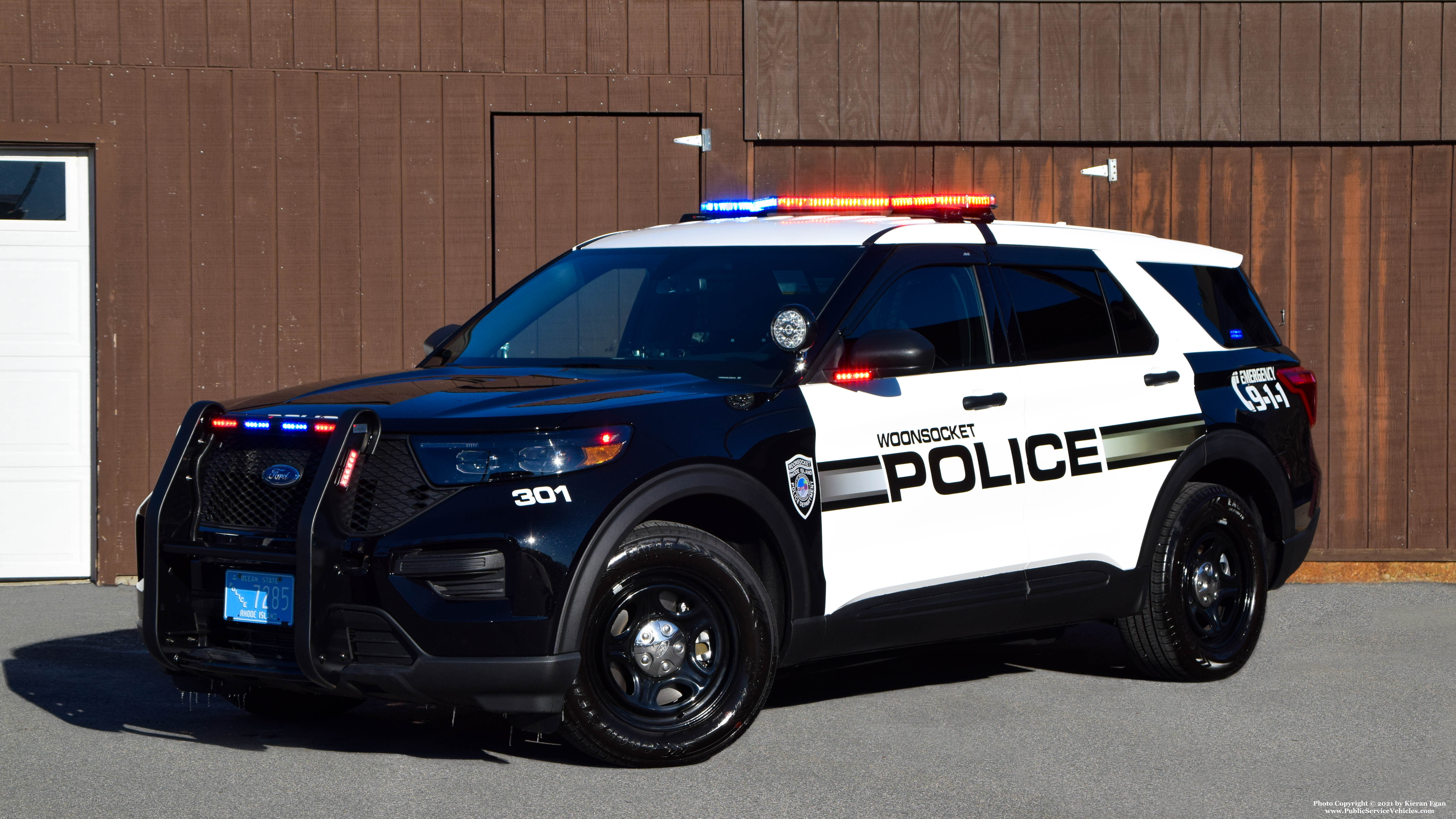 A photo  of Woonsocket Police
            Cruiser 301, a 2021 Ford Police Interceptor Utility             taken by Kieran Egan