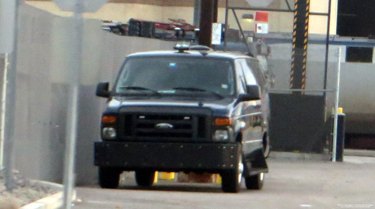 A photo  of Amtrak Police
            Prisoner Transport Unit, a 2008-2015 Ford Econoline             taken by Kieran Egan