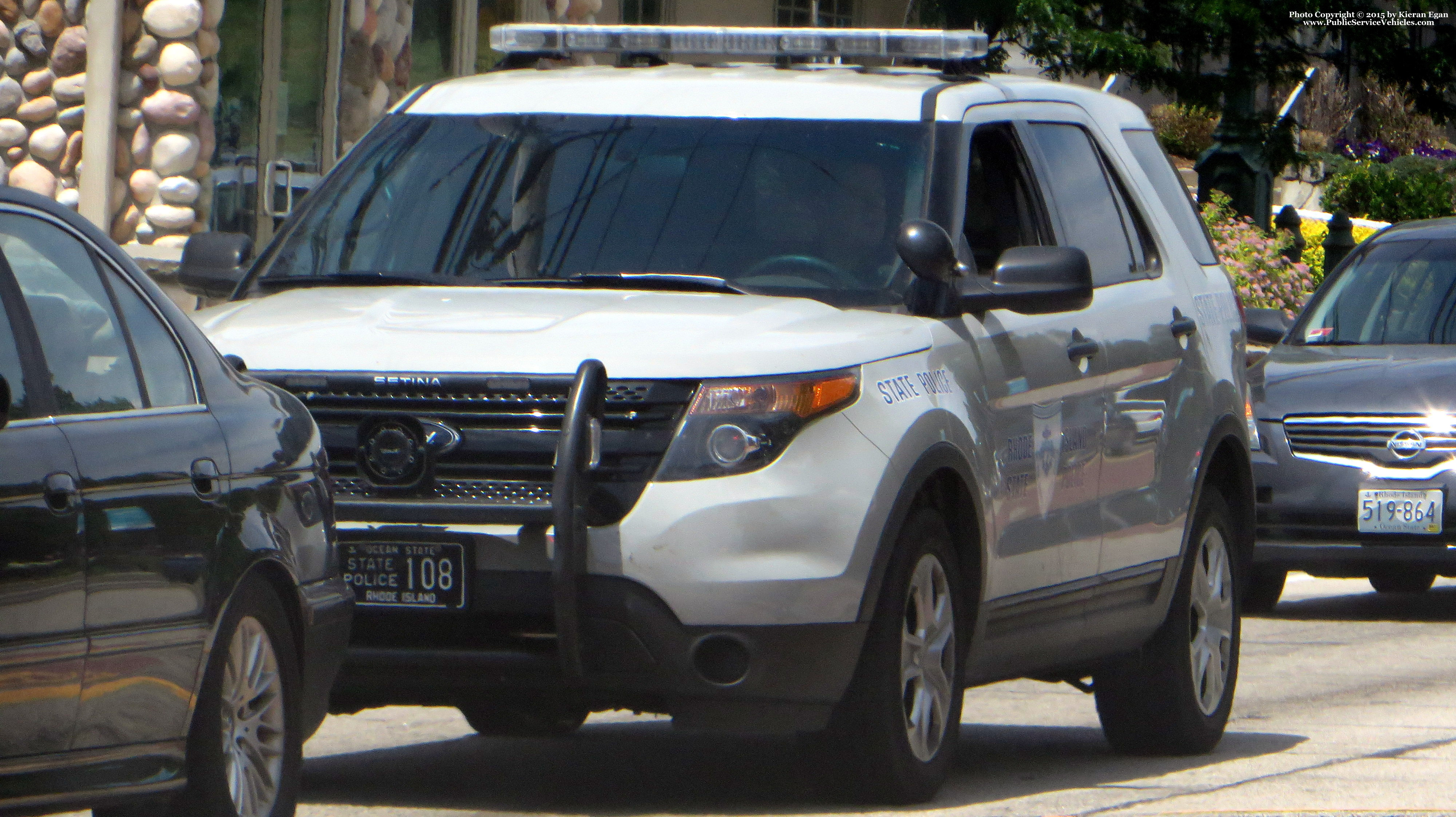 A photo  of Rhode Island State Police
            Cruiser 108, a 2013-2015 Ford Police Interceptor Utility             taken by Kieran Egan