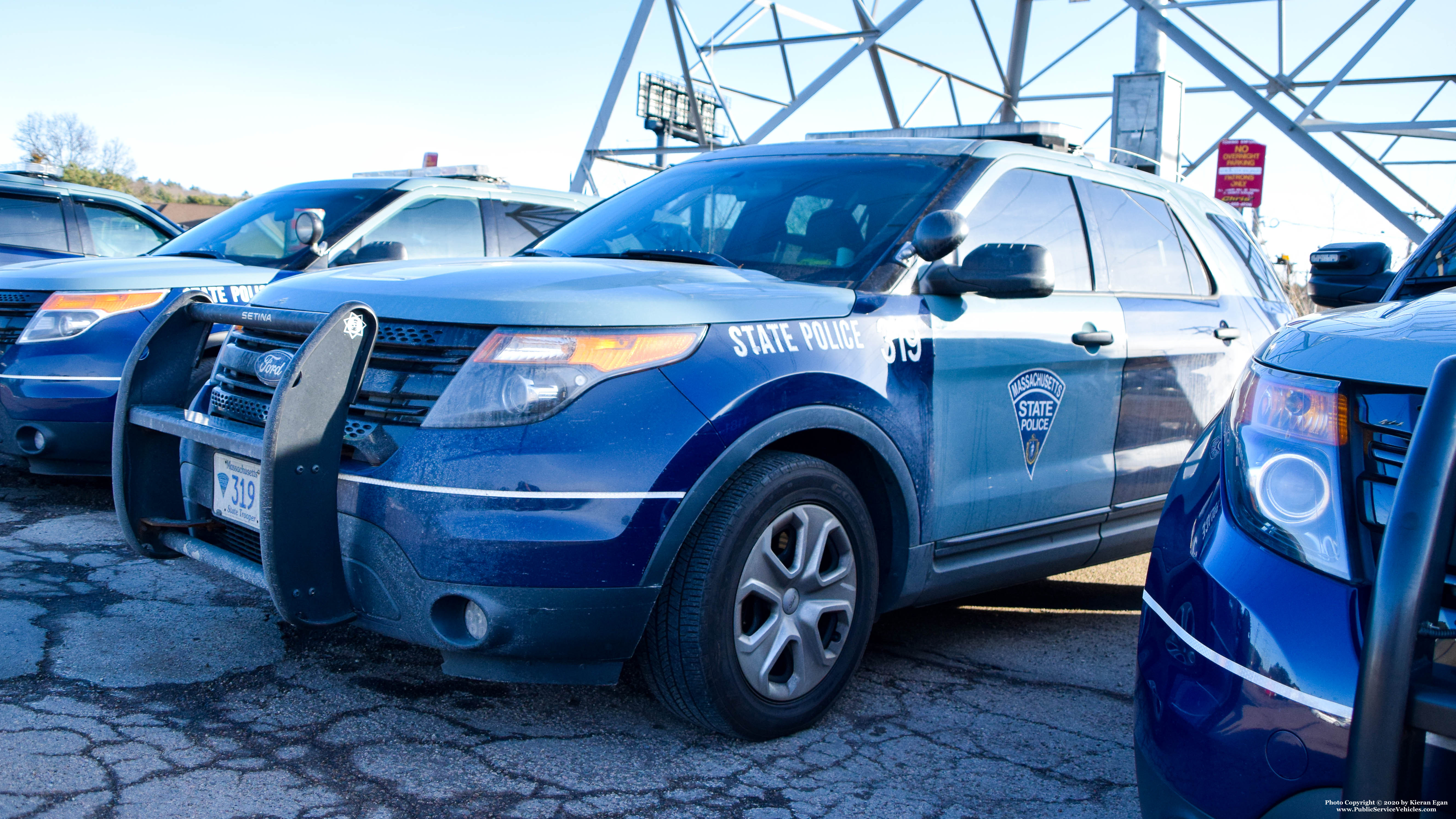A photo  of Massachusetts State Police
            Cruiser 319, a 2013-2015 Ford Police Interceptor Utility             taken by Kieran Egan