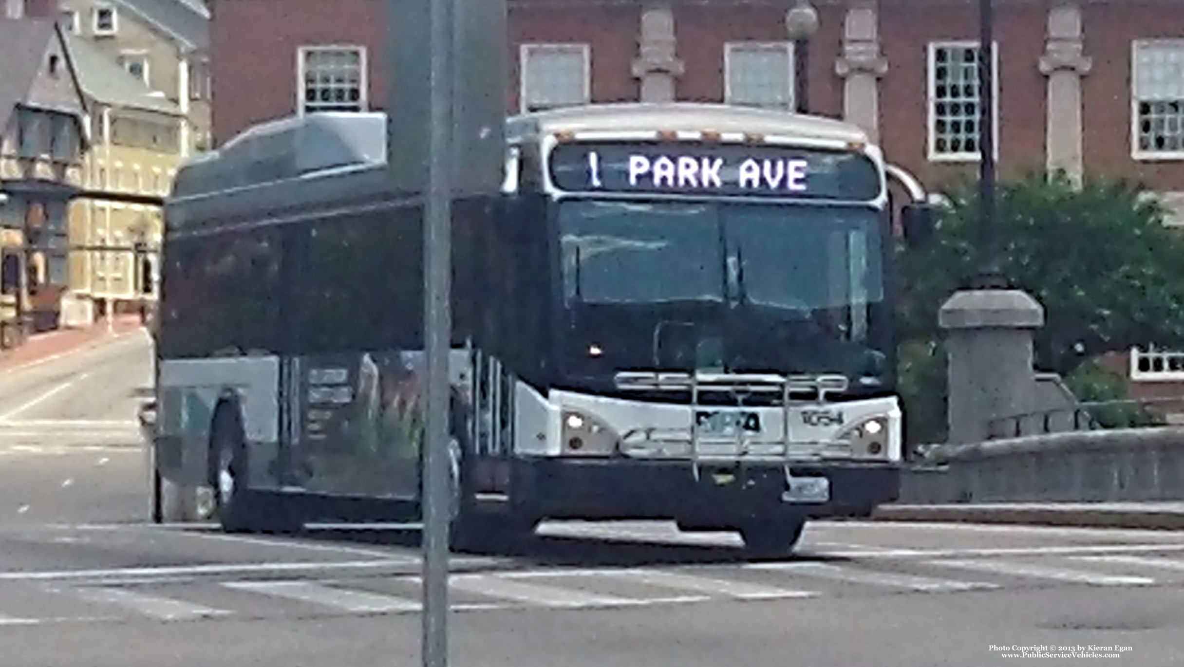 A photo  of Rhode Island Public Transit Authority
            Bus 1064, a 2010 Gillig BRT HEV             taken by Kieran Egan