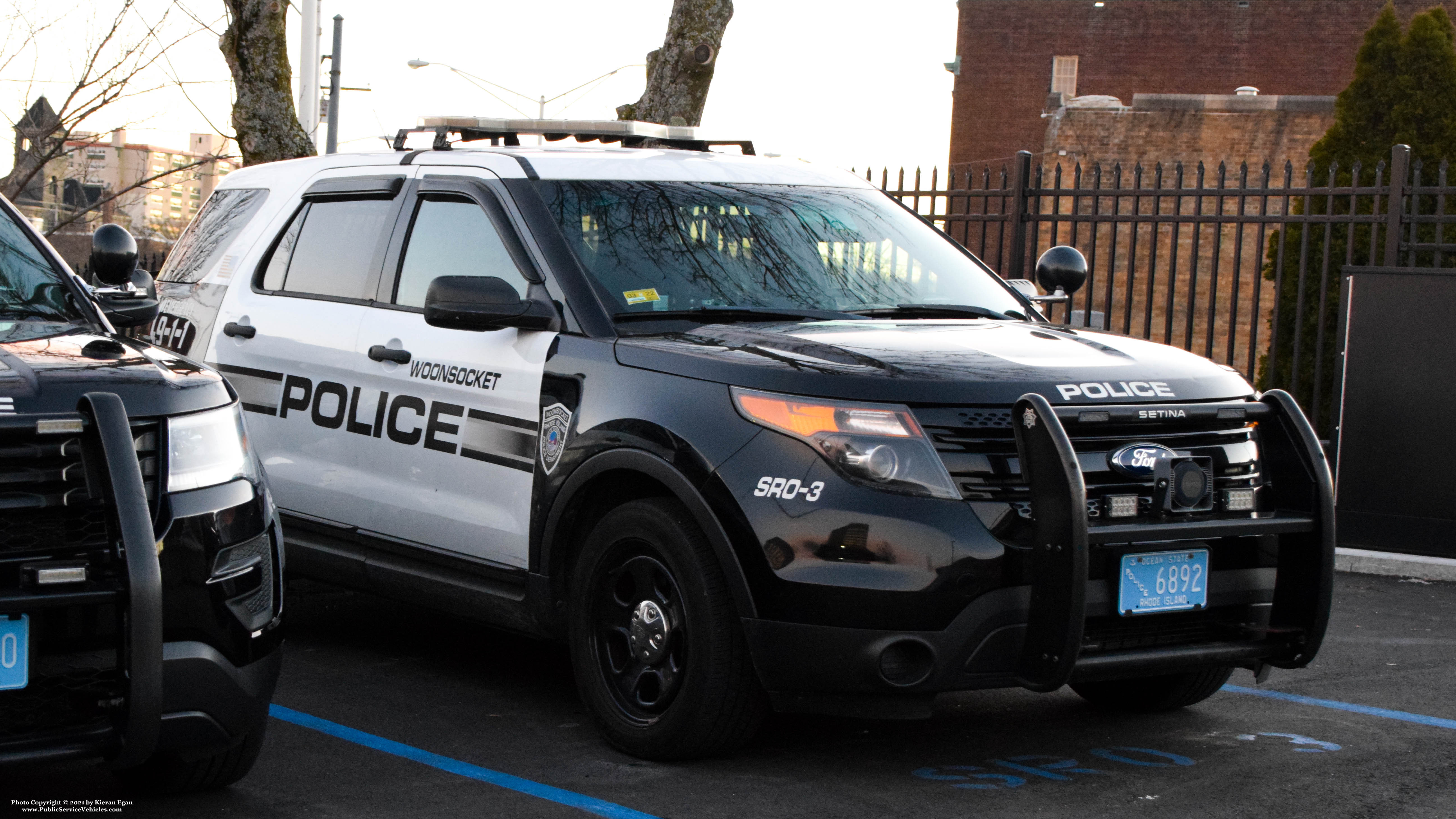 A photo  of Woonsocket Police
            SRO-3, a 2013-2015 Ford Police Interceptor Utility             taken by Kieran Egan