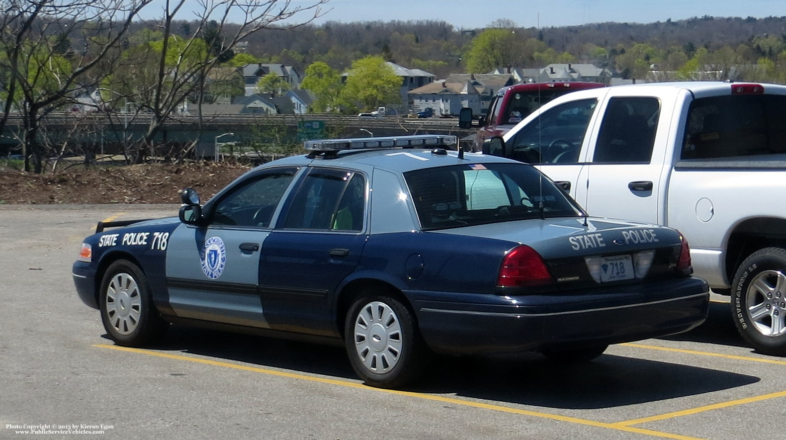 A photo  of Massachusetts State Police
            Cruiser 718, a 2009-2011 Ford Crown Victoria Police Interceptor             taken by Kieran Egan