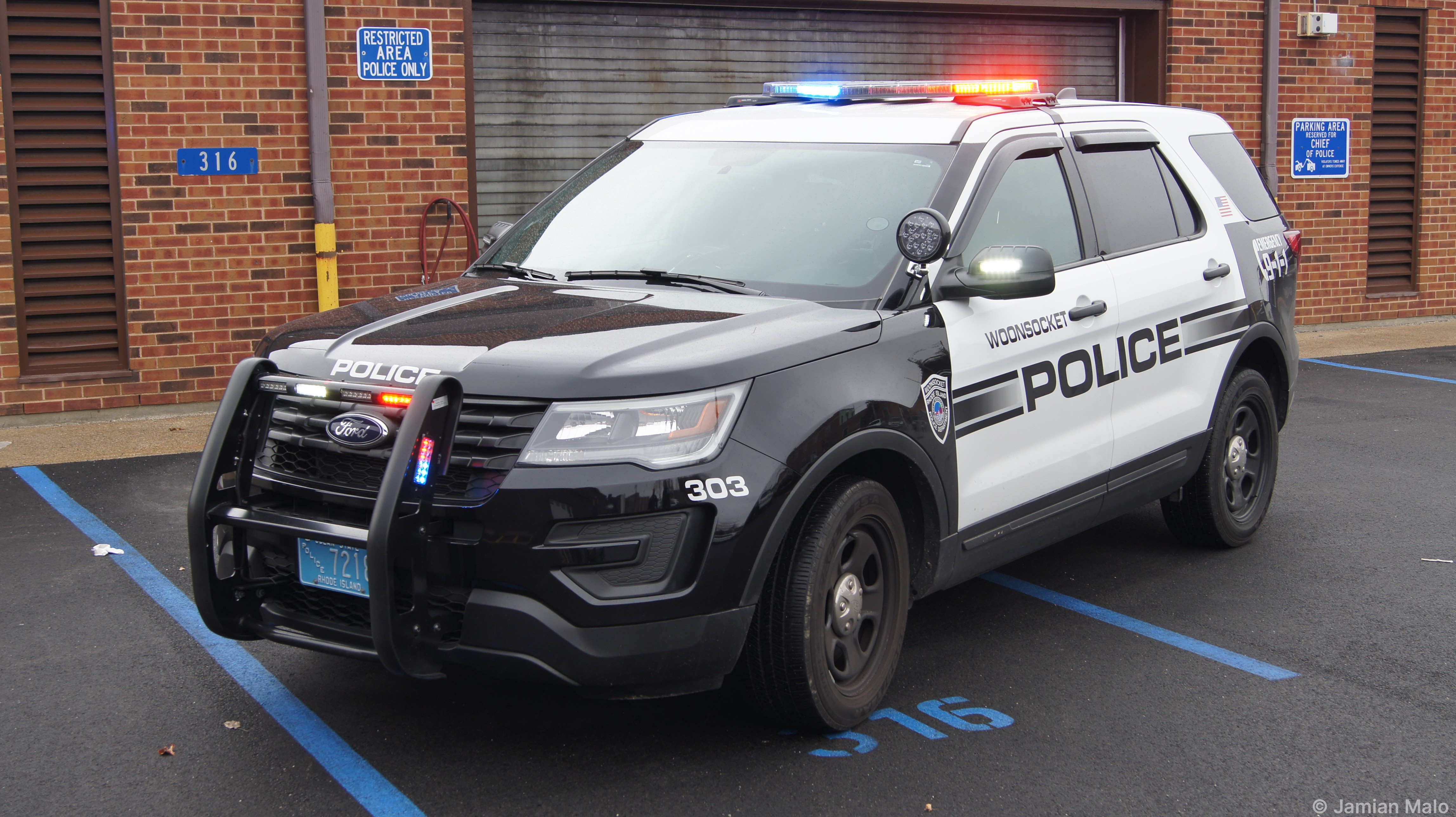 A photo  of Woonsocket Police
            Cruiser 303, a 2019 Ford Police Interceptor Utility             taken by Jamian Malo