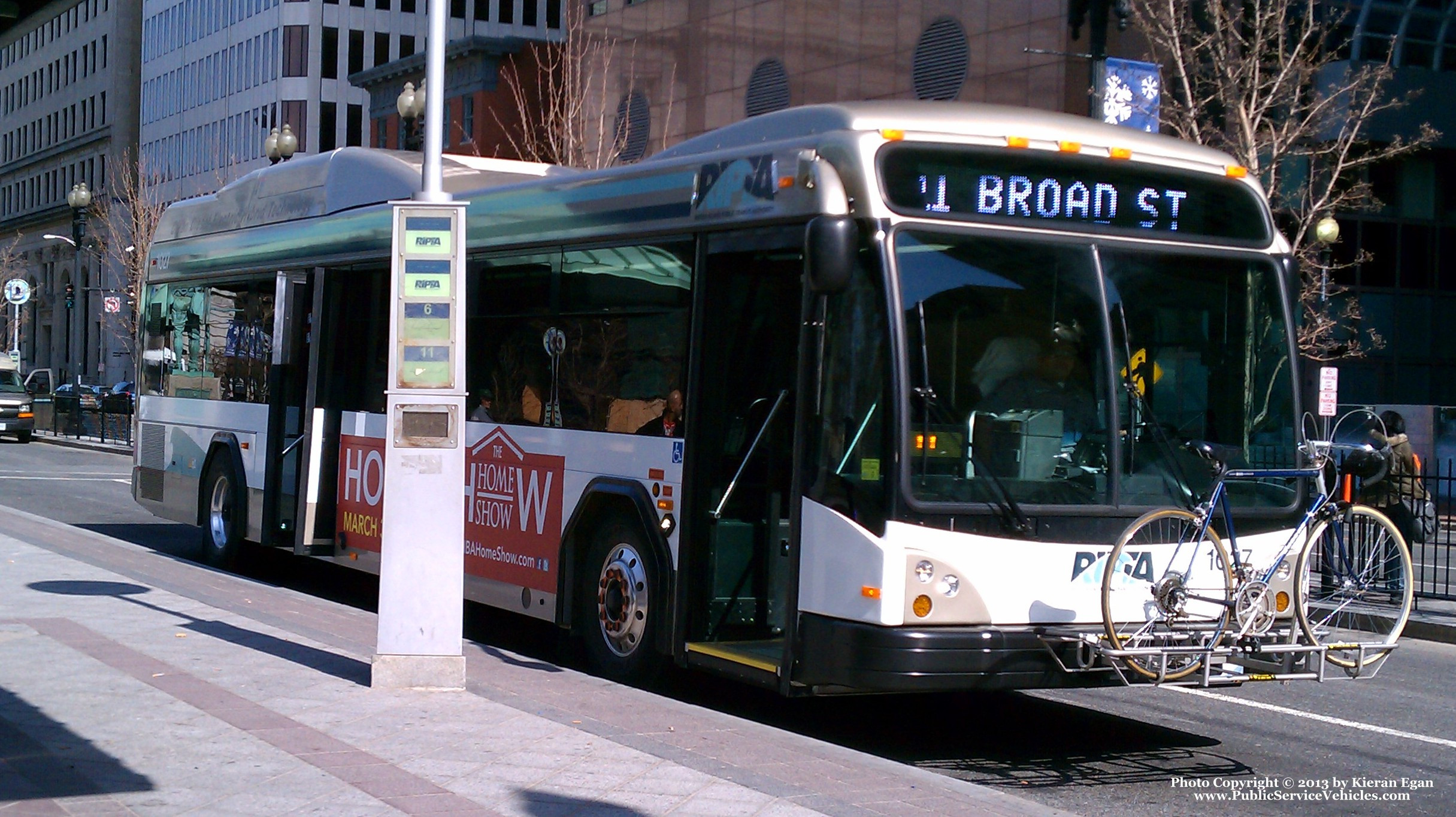 A photo  of Rhode Island Public Transit Authority
            Bus 1027, a 2010 Gillig BRT HEV             taken by Kieran Egan