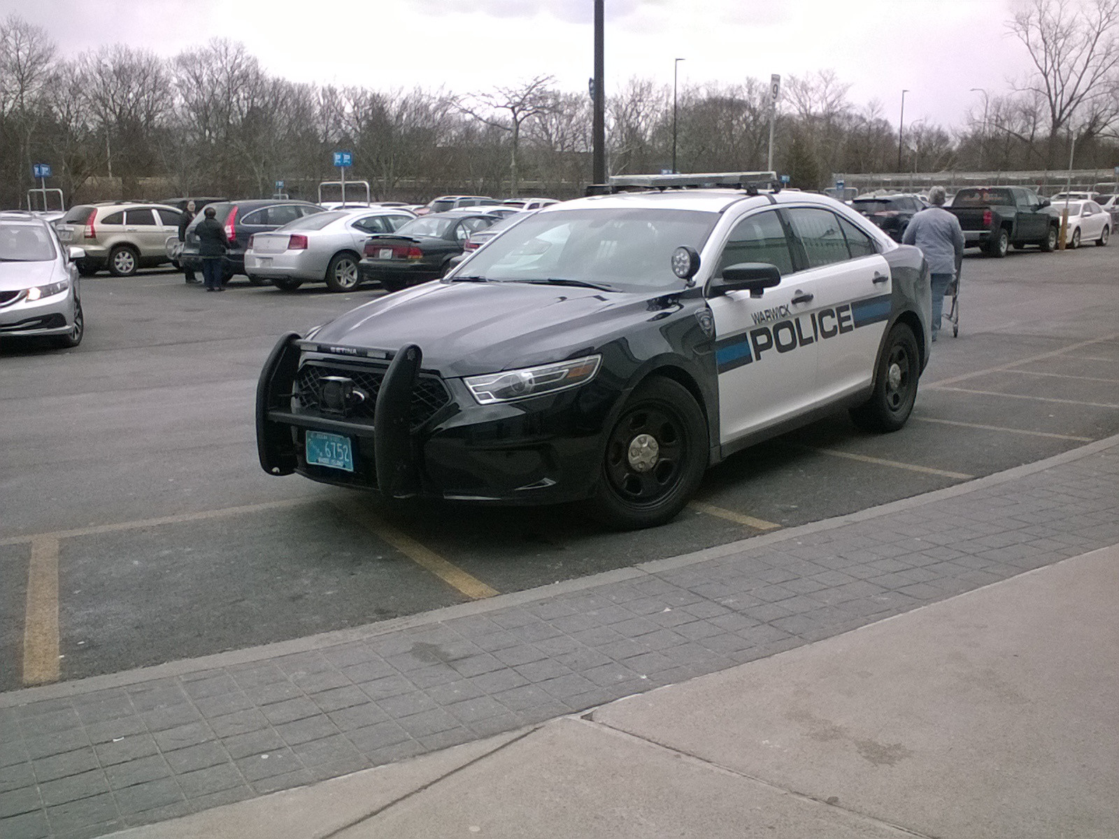 A photo  of Warwick Police
            Cruiser P-21, a 2013-2018 Ford Police Interceptor Sedan             taken by @riemergencyvehicles
