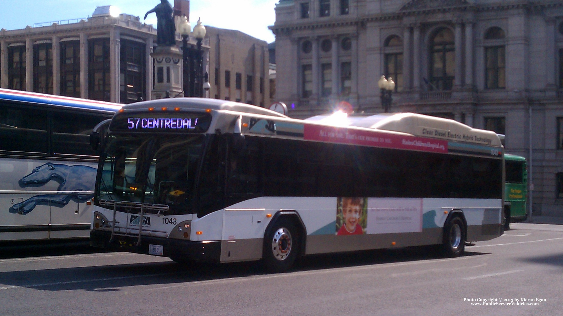 A photo  of Rhode Island Public Transit Authority
            Bus 1043, a 2010 Gillig BRT HEV             taken by Kieran Egan