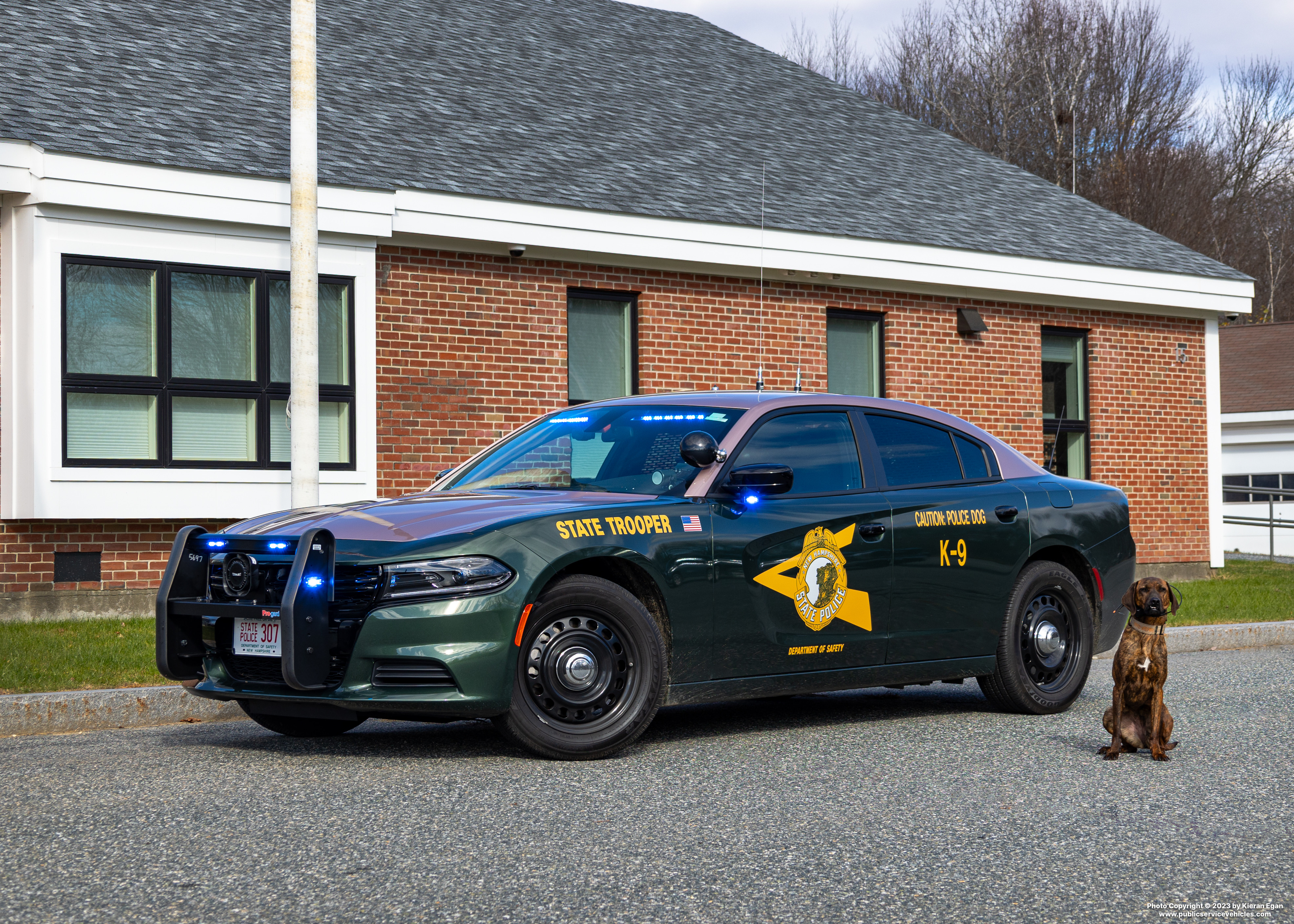 A photo  of New Hampshire State Police
            Cruiser 307, a 2022 Dodge Charger             taken by Kieran Egan