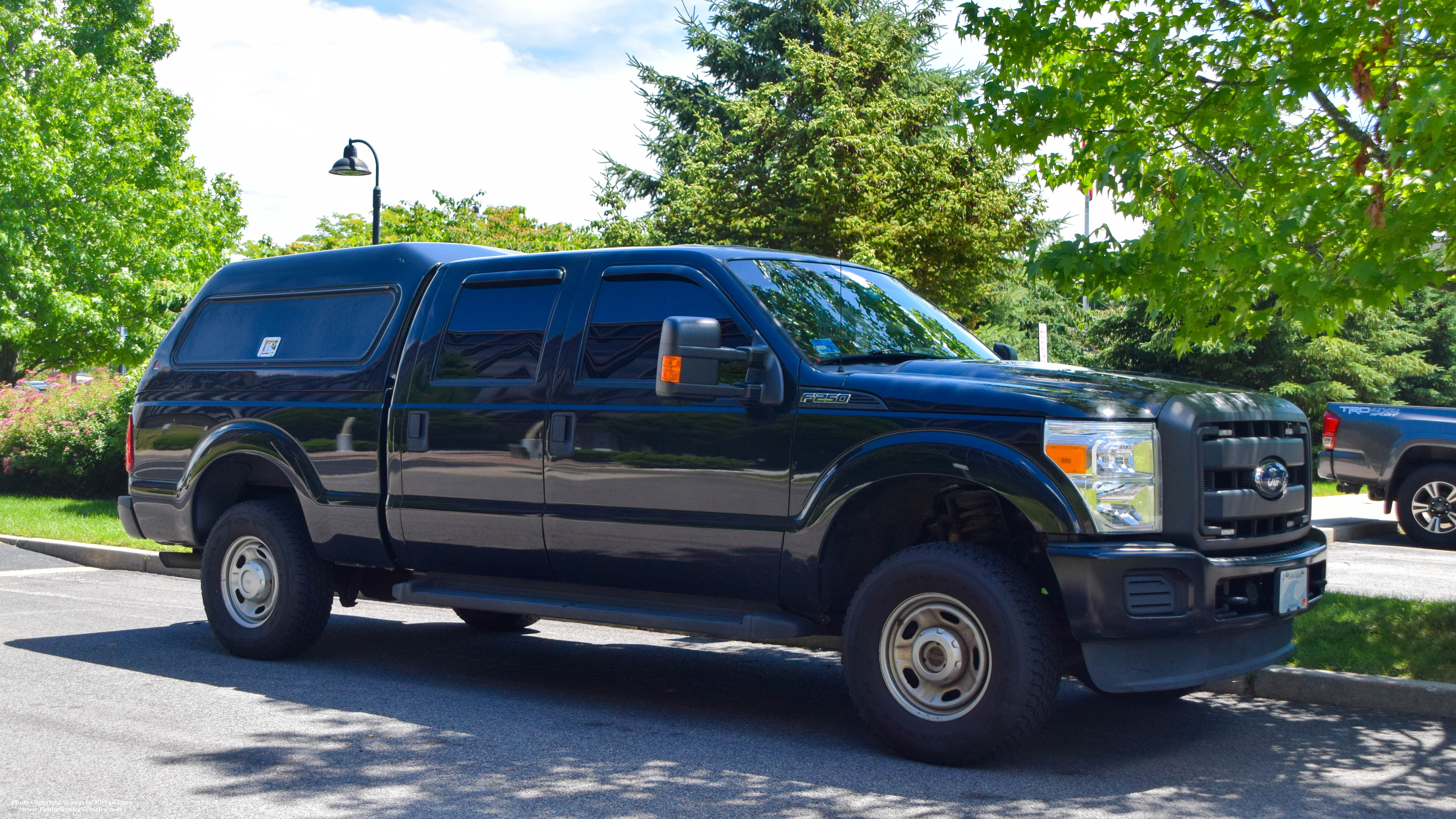 A photo  of Rhode Island State Police
            Cruiser 169, a 2013 Ford F-250             taken by Kieran Egan