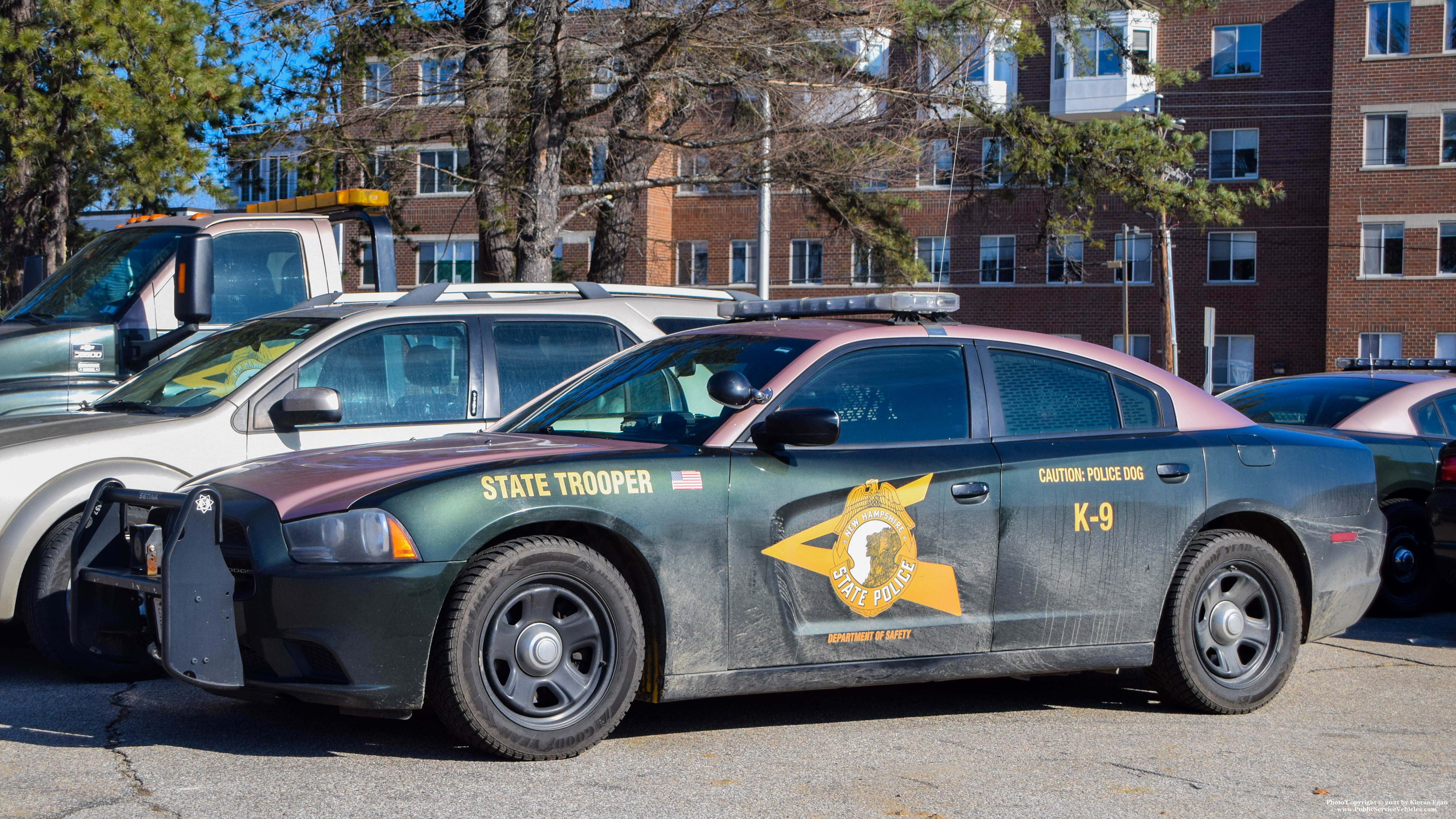 A photo  of New Hampshire State Police
            Cruiser 926, a 2011-2014 Dodge Charger             taken by Kieran Egan
