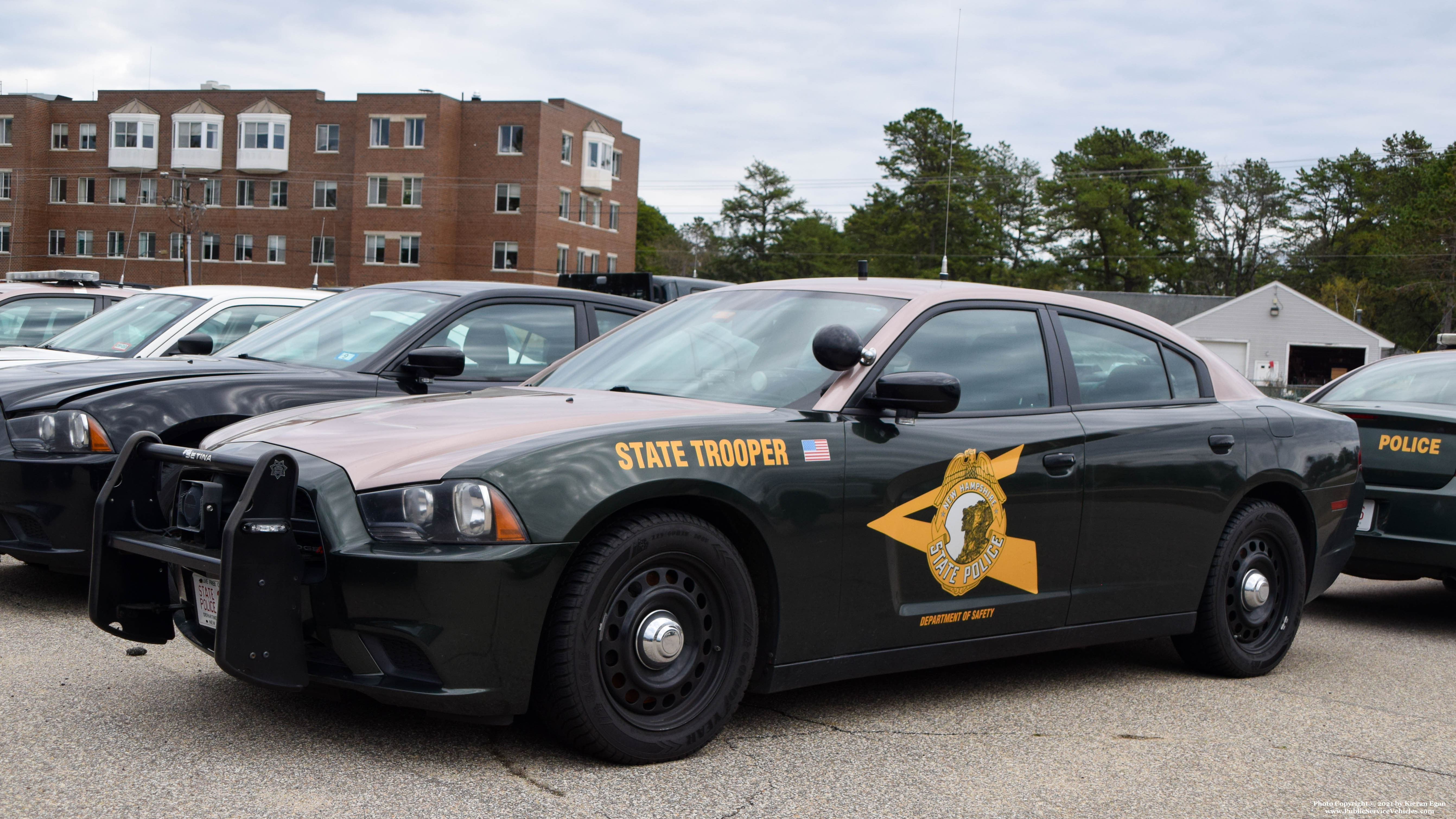 A photo  of New Hampshire State Police
            Cruiser 233, a 2014 Dodge Charger             taken by Kieran Egan