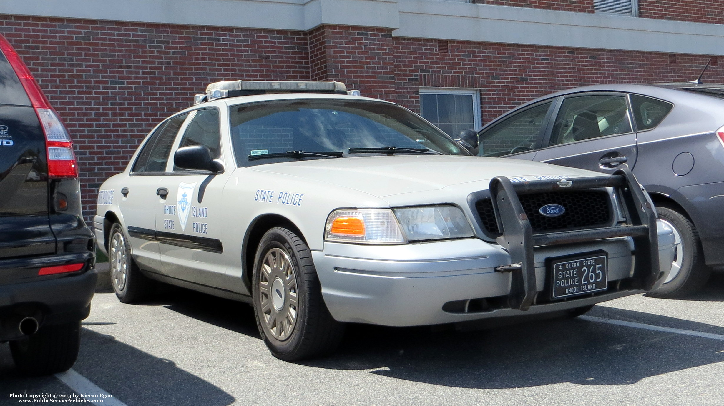 A photo  of Rhode Island State Police
            Cruiser 265, a 2003-2005 Ford Crown Victoria Police Interceptor             taken by Kieran Egan