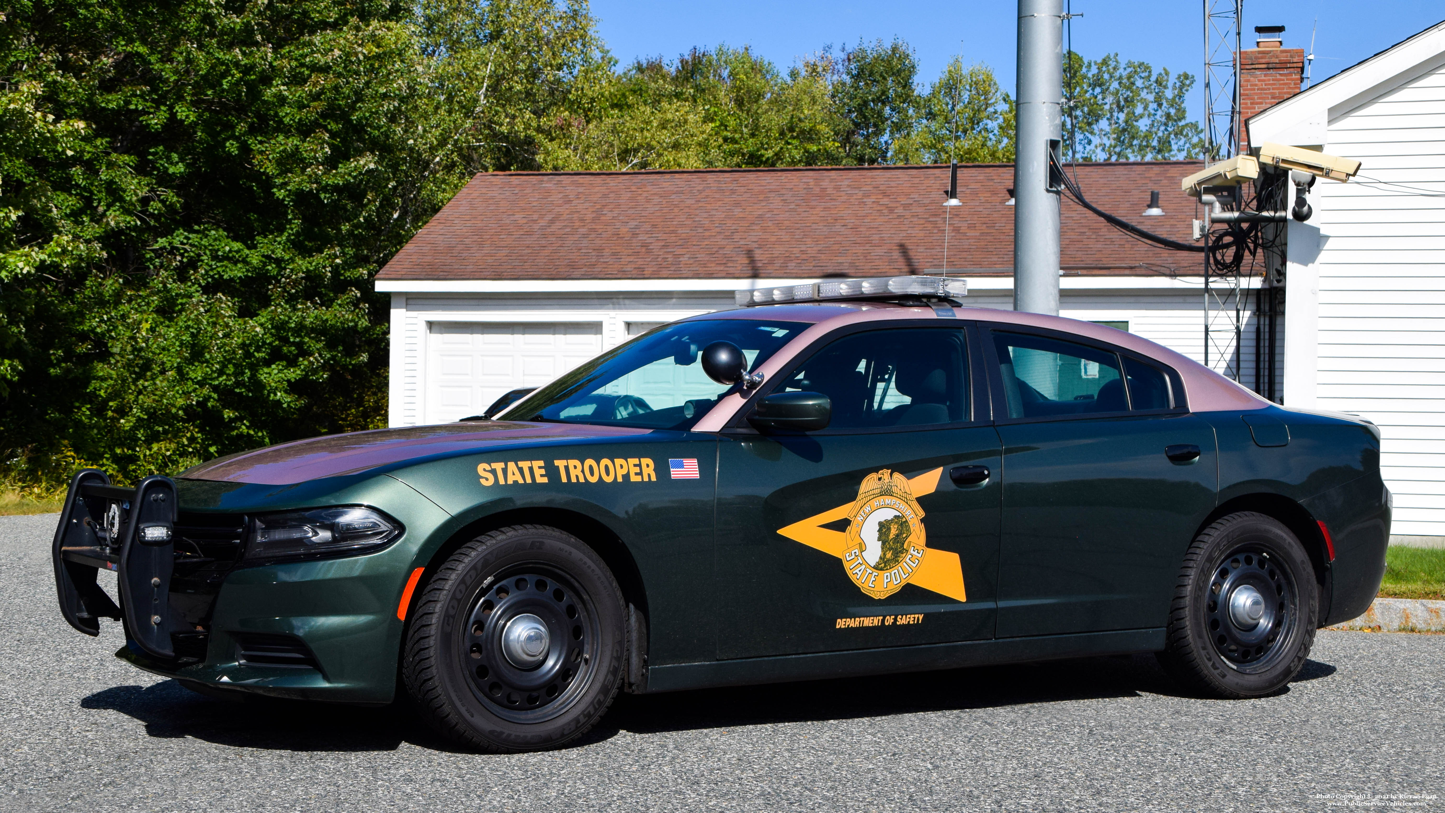 A photo  of New Hampshire State Police
            Cruiser 318, a 2015-2019 Dodge Charger             taken by Kieran Egan