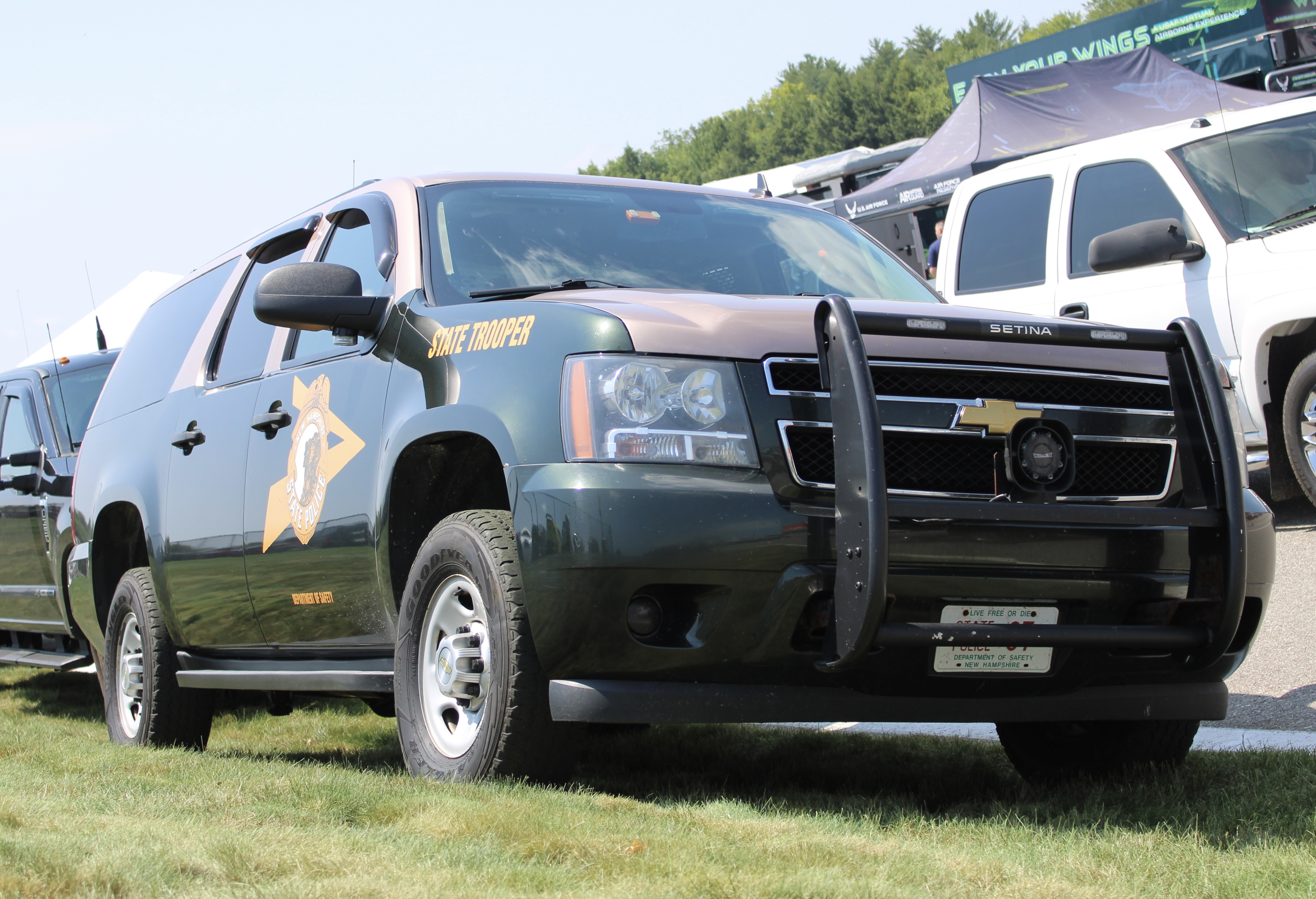 A photo  of New Hampshire State Police
            Cruiser 87, a 2007-2014 Chevrolet Suburban             taken by @riemergencyvehicles