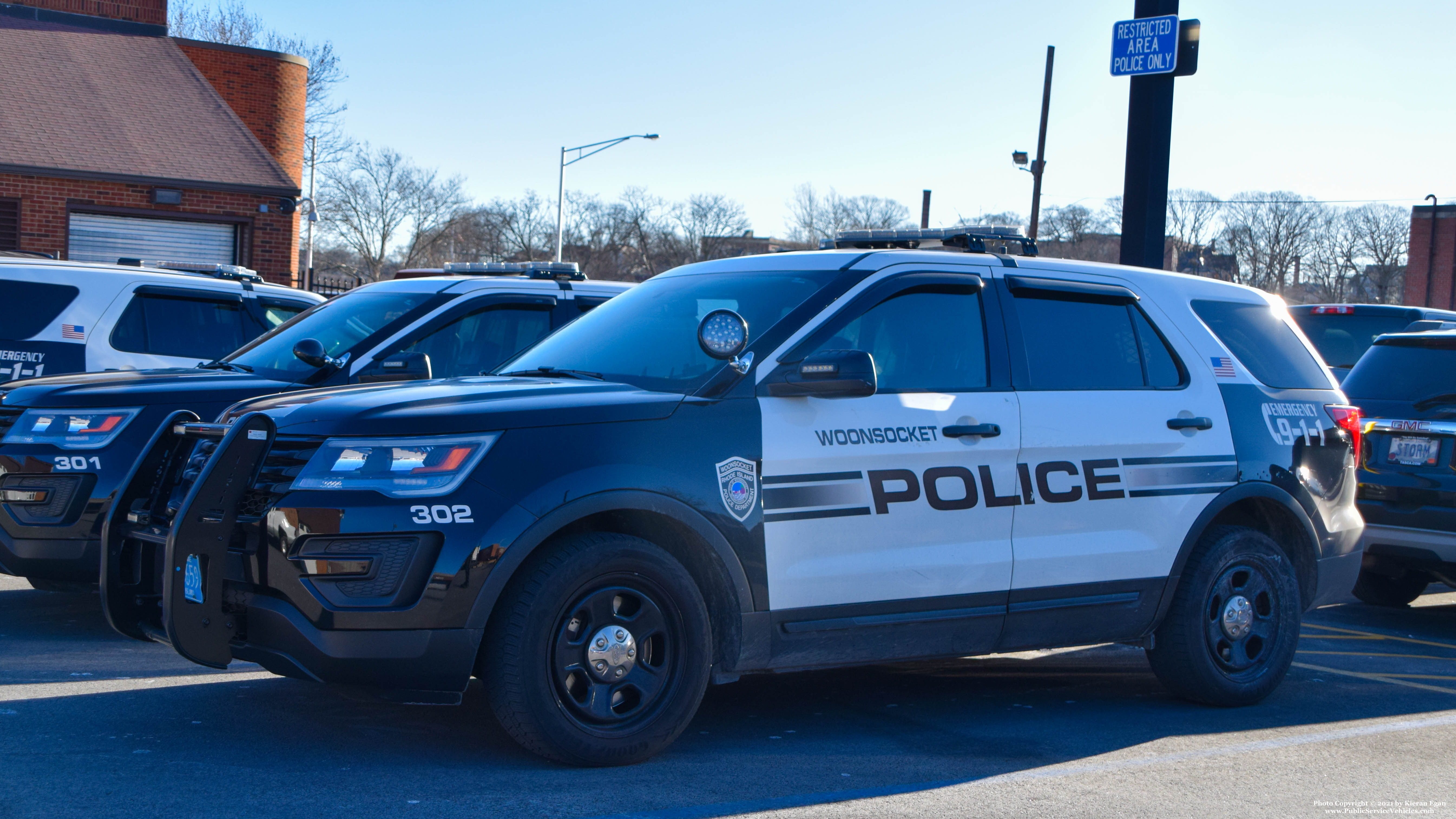 A photo  of Woonsocket Police
            Cruiser 302, a 2017 Ford Police Interceptor Utility             taken by Kieran Egan