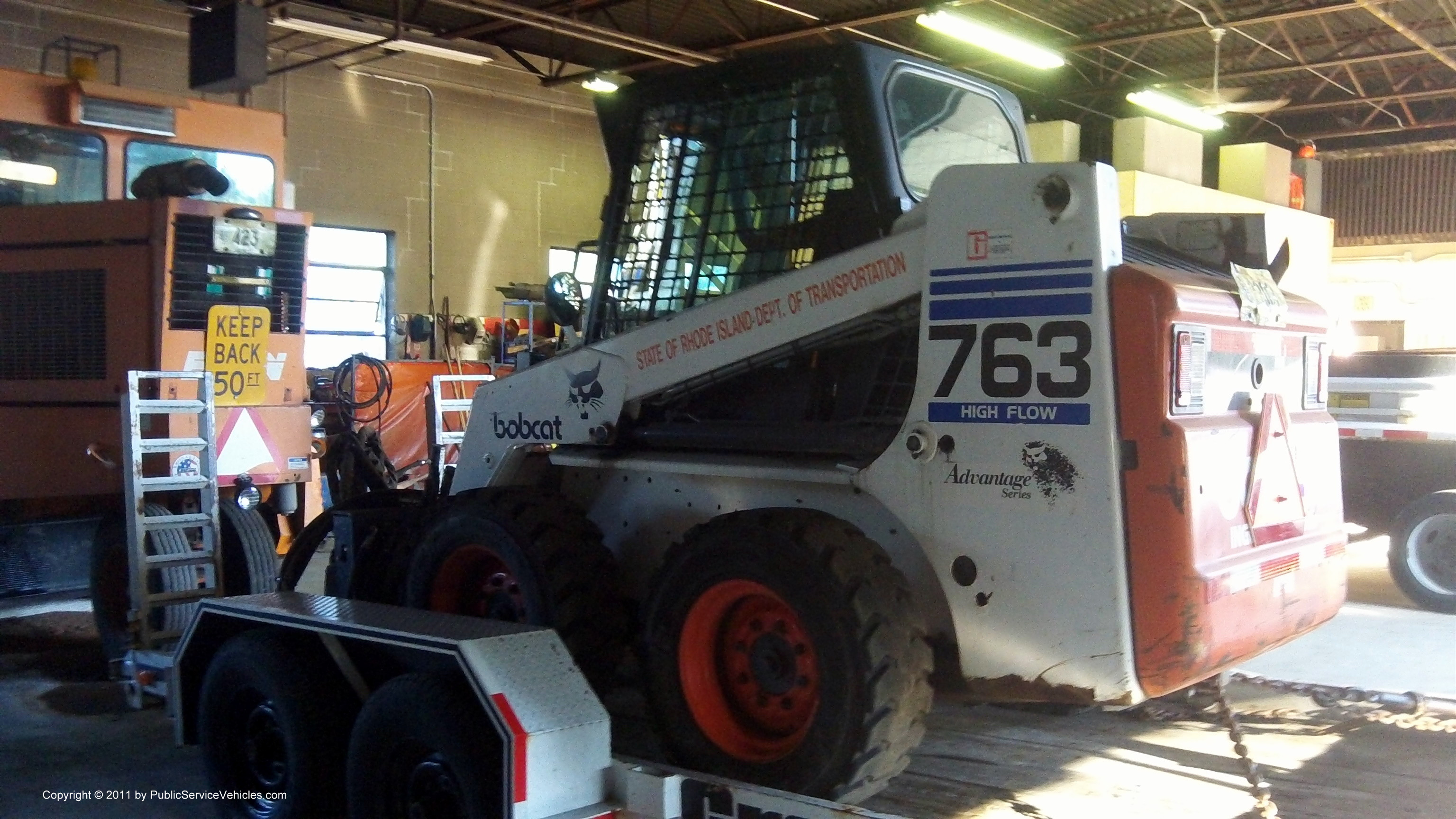 A photo  of Rhode Island Department of Transportation
            Skid Steer 2303, a 1990-2010 Bobcat 763             taken by Kieran Egan