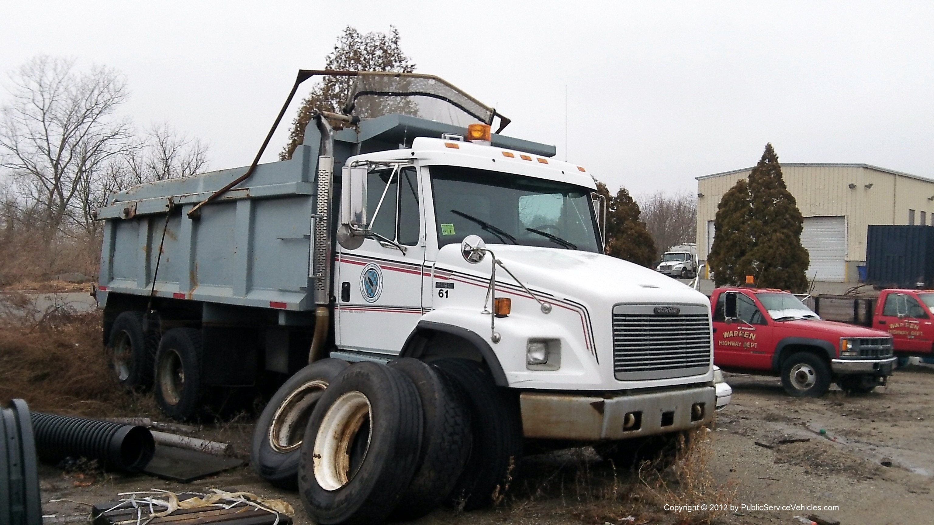 A photo  of Warren Public Works
            Truck 61, a 1991-2007 Freightliner FL80             taken by Kieran Egan