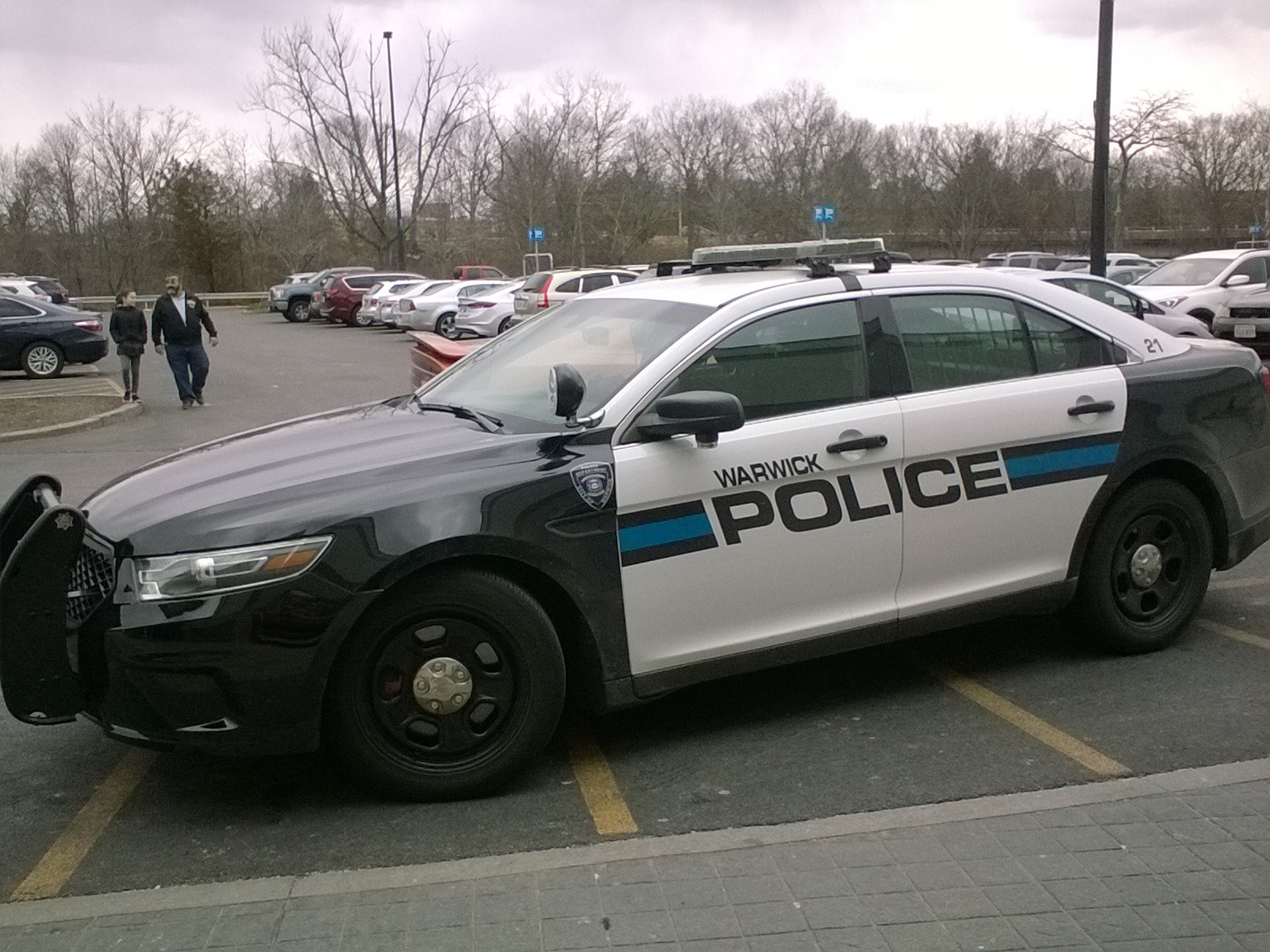 A photo  of Warwick Police
            Cruiser P-21, a 2013-2018 Ford Police Interceptor Sedan             taken by @riemergencyvehicles