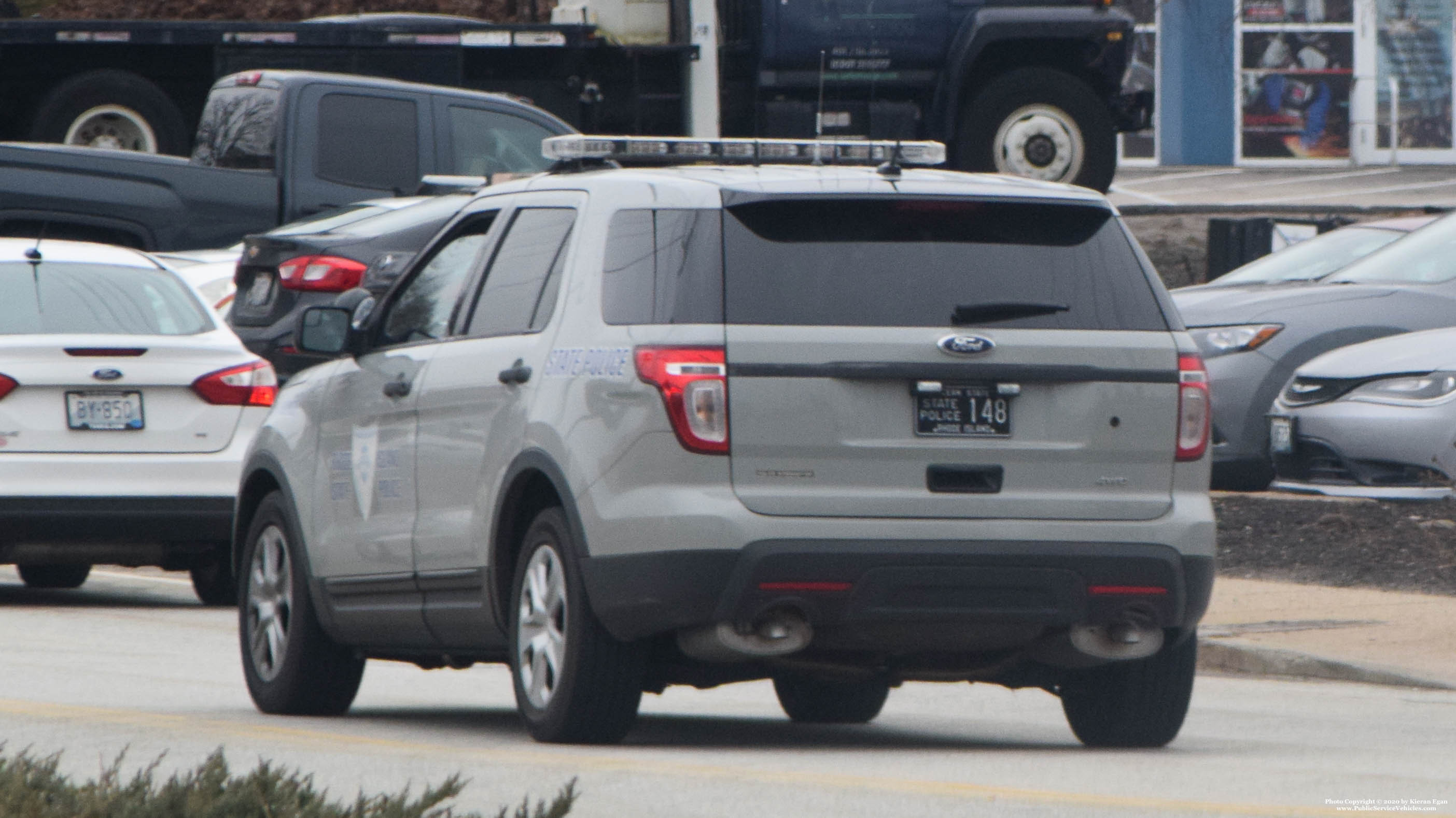 A photo  of Rhode Island State Police
            Cruiser 148, a 2013-2015 Ford Police Interceptor Utility             taken by Kieran Egan