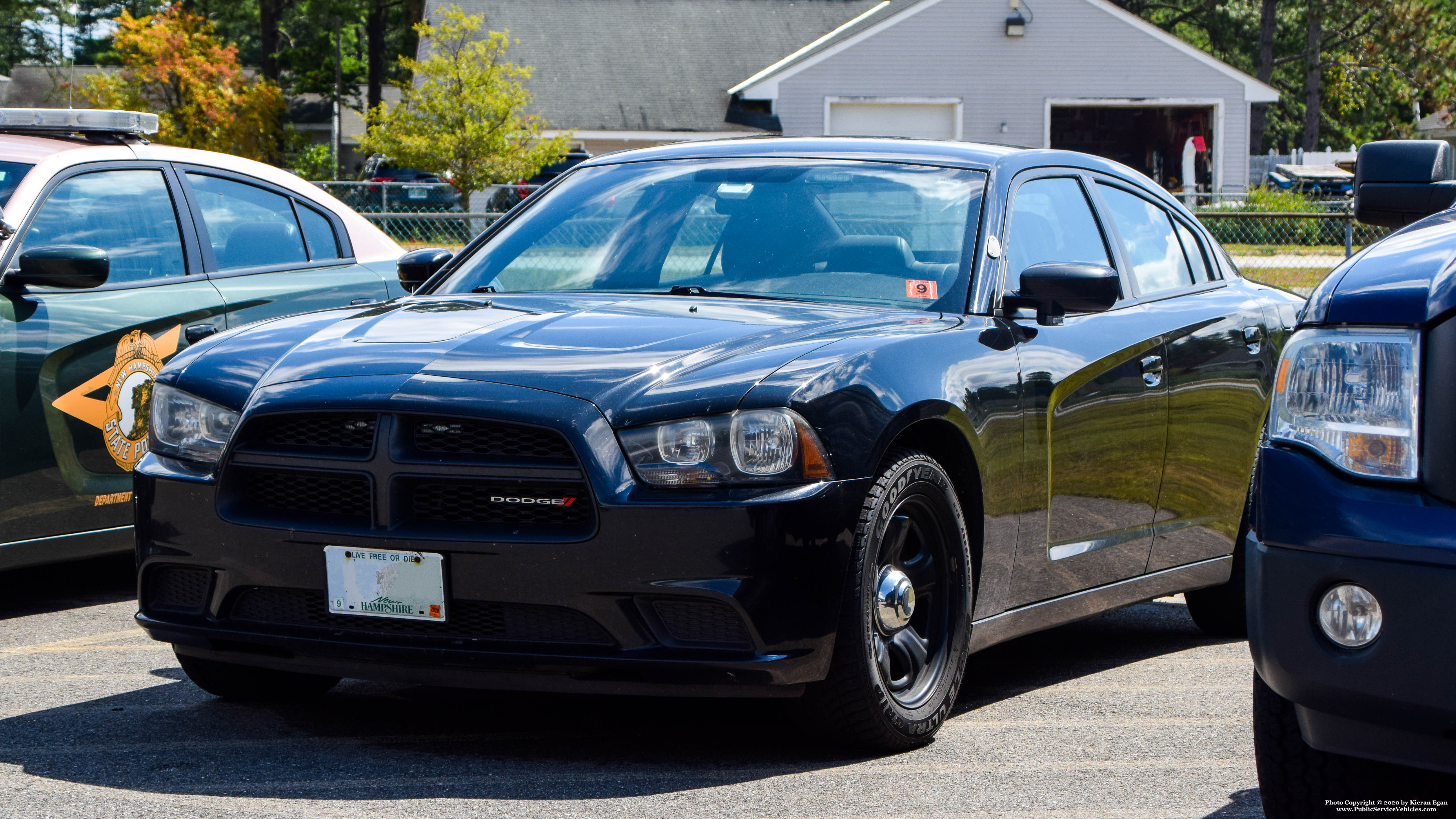 A photo  of New Hampshire State Police
            Unmarked Unit, a 2011-2014 Dodge Charger             taken by Kieran Egan