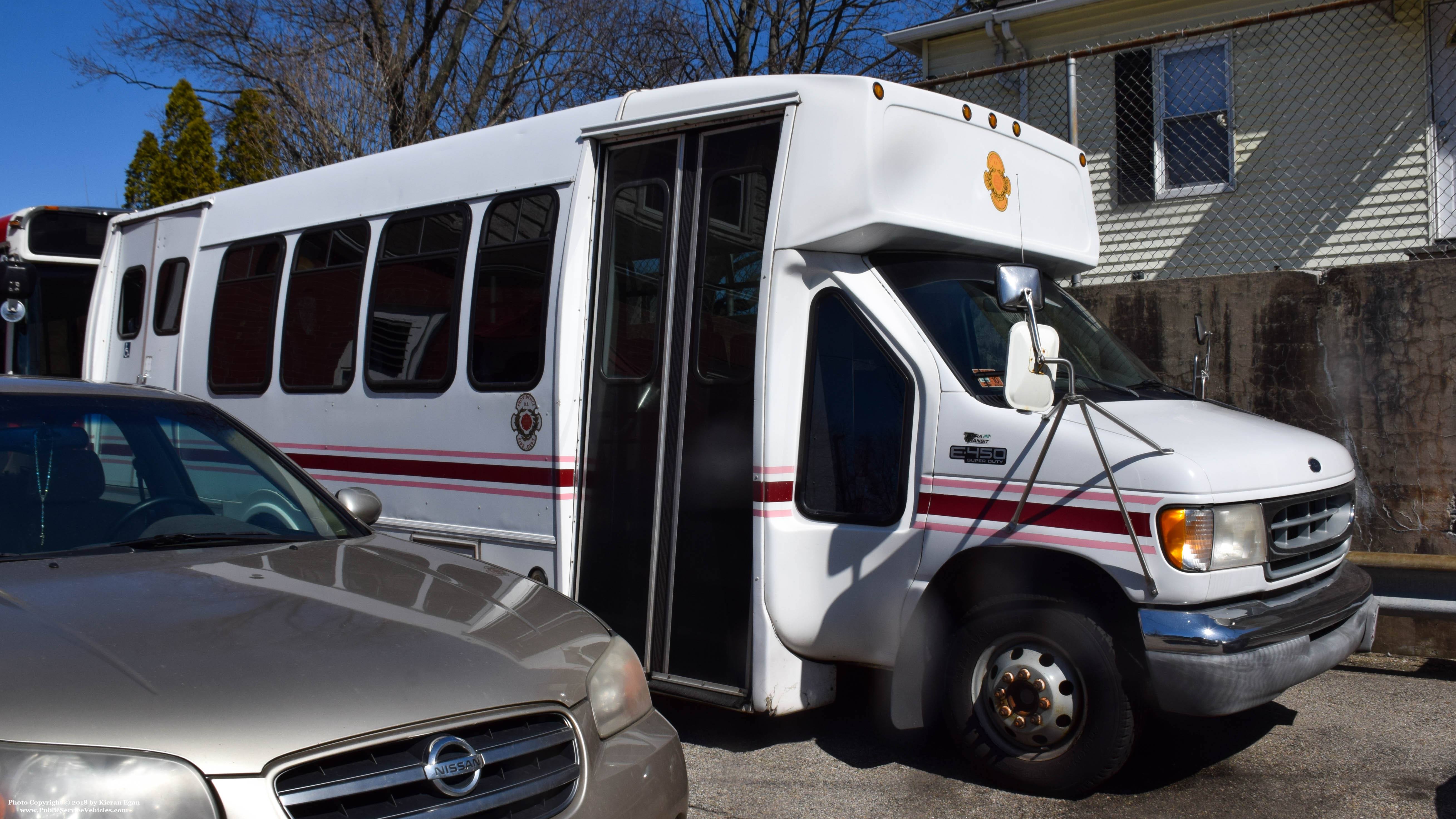 A photo  of Providence Fire
            Motor Transport 1, a 1991-2006 Ford E-350 Bus             taken by Kieran Egan