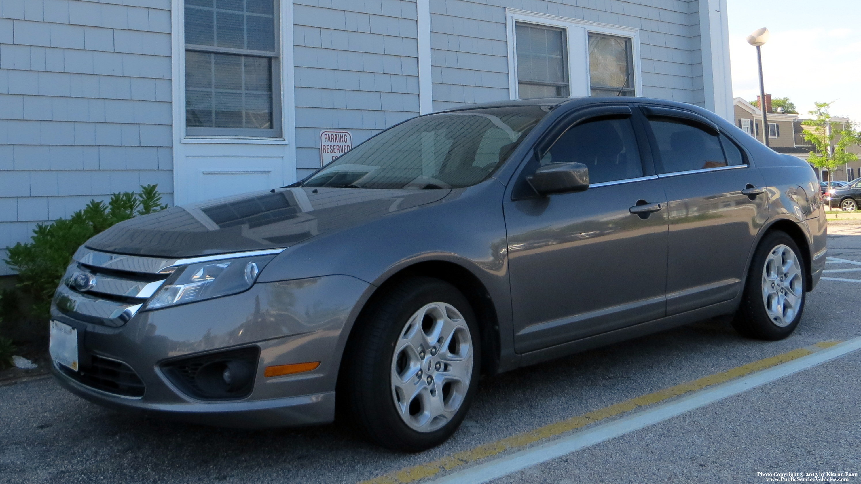 A photo  of Narragansett Police
            Deputy Chief's Unit, a 2010-2012 Ford Fusion             taken by Kieran Egan