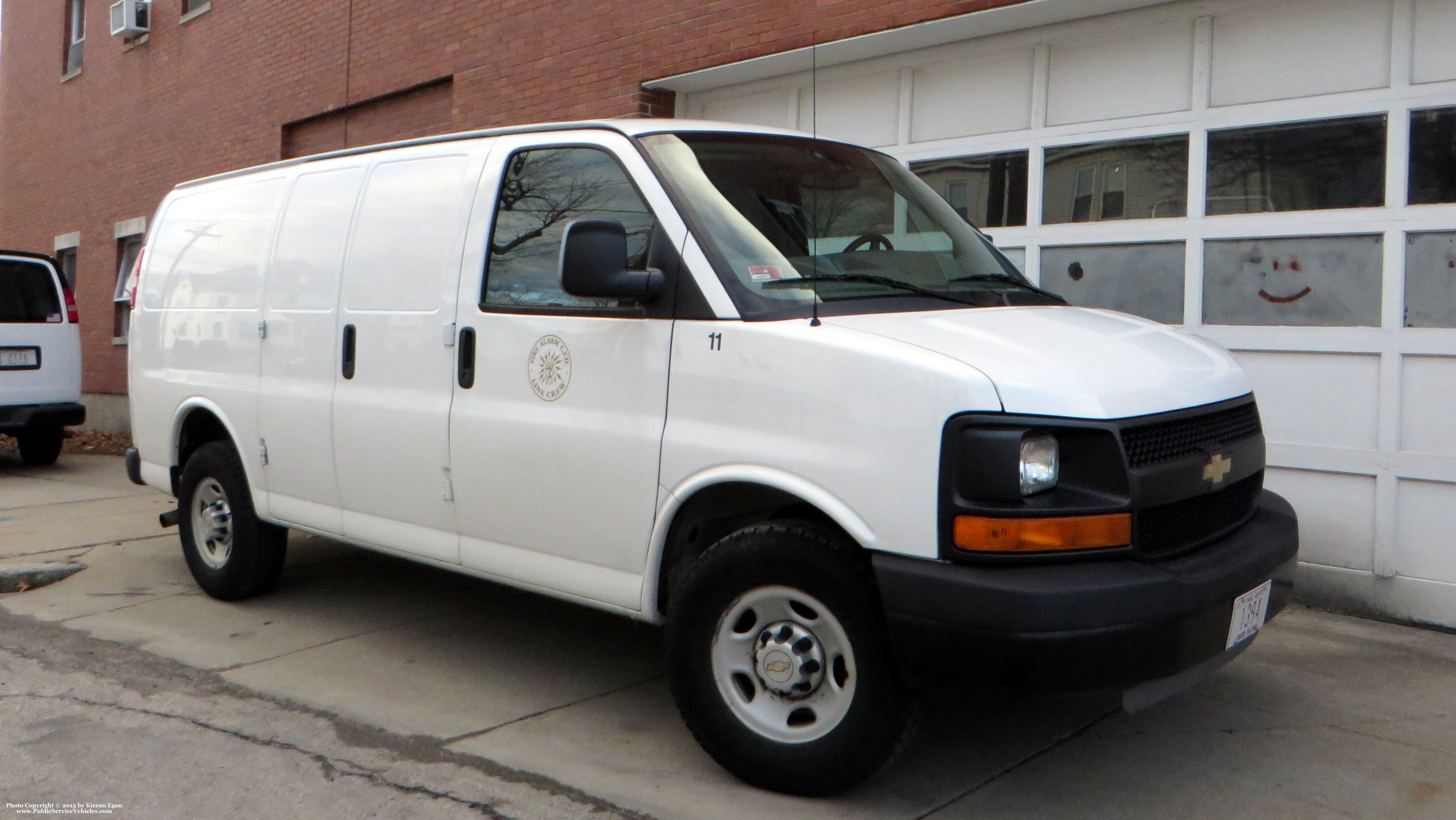 A photo  of Cranston Fire
            Car 11, a 2003-2014 Chevrolet Express             taken by Kieran Egan